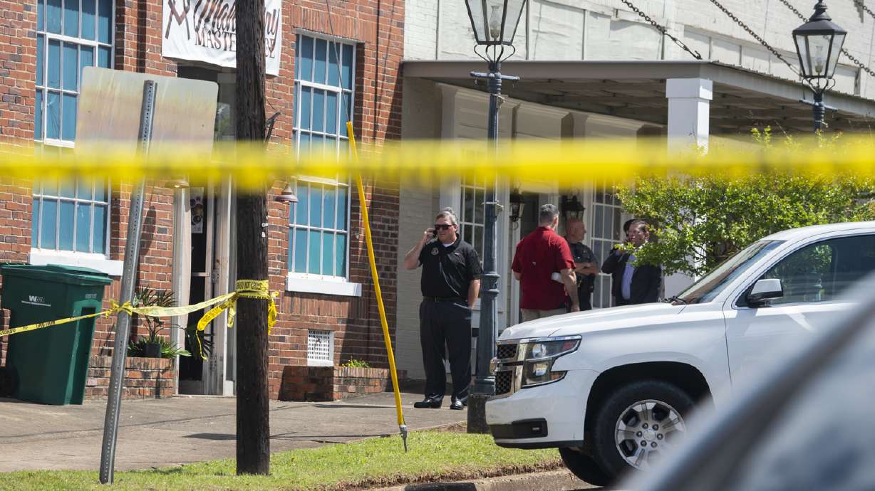 Law enforcement continues to investigate a mass shooting at Mahogany Masterpiece dance studio in Dadeville, Ala., on Sunday. Alabama investigators say two teenagers have been arrested and charged with murder.