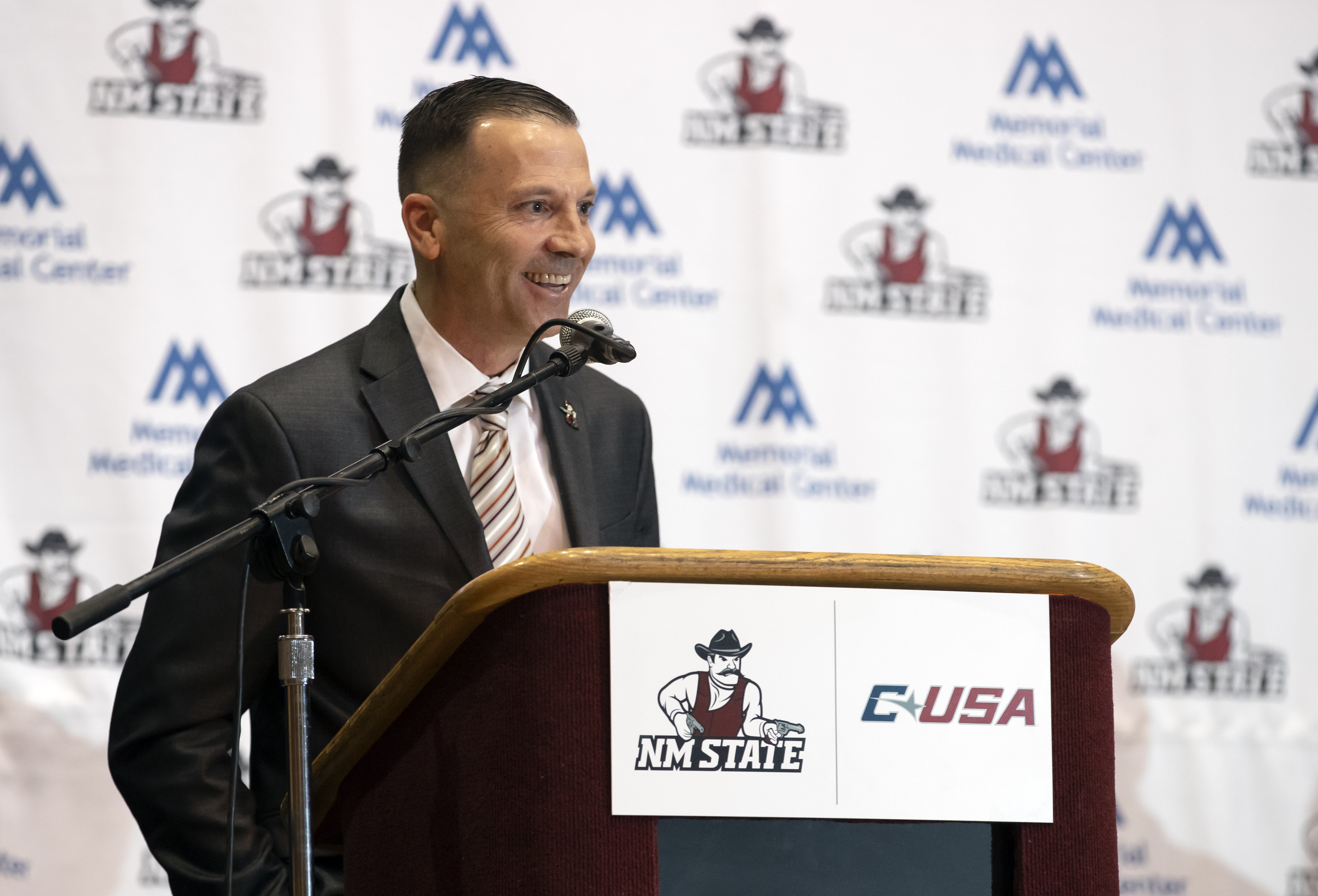 Newly appointed New Mexico State NCAA college basketball coach Jason Hooten speaks during his introduction event in Las Cruces, N.M., Sunday, March 26, 2023. 