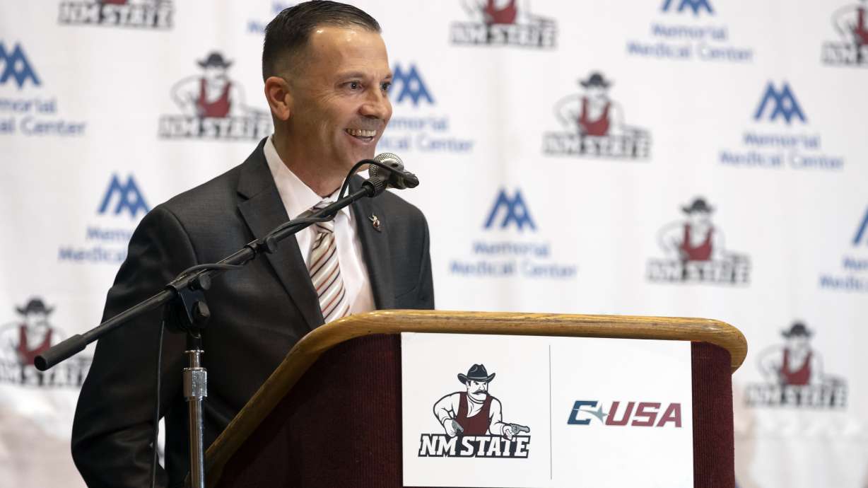 Newly appointed New Mexico State NCAA college basketball coach Jason Hooten speaks during his introduction event in Las Cruces, N.M., Sunday, March 26, 2023.