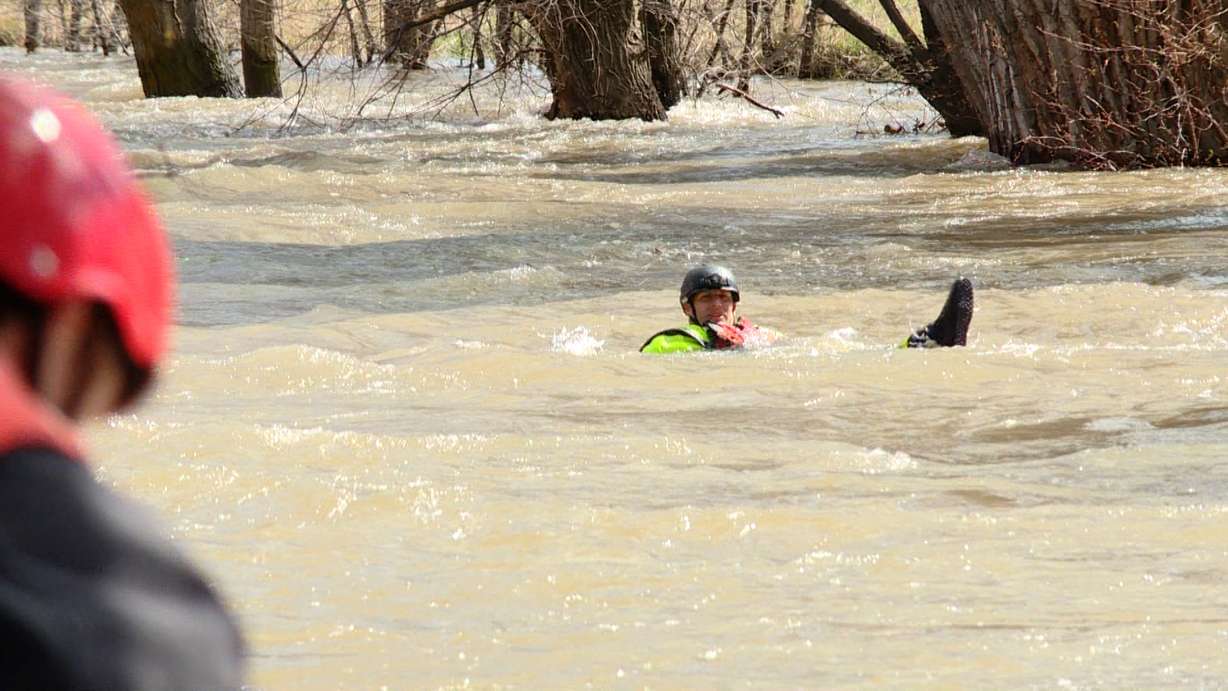 Agencies from all over Weber County practice swift water rescues along the Ogden River Wednesday, in anticipation of strong river flows.