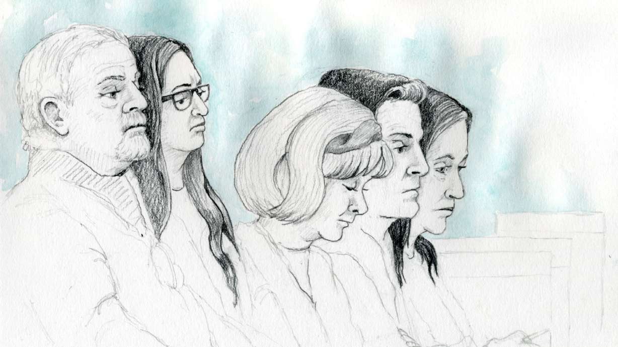 Family members of Lori Vallow Daybell and Charles Vallow listen to testimony in Daybell's murder trial from the courthouse in Boise on Wednesday.