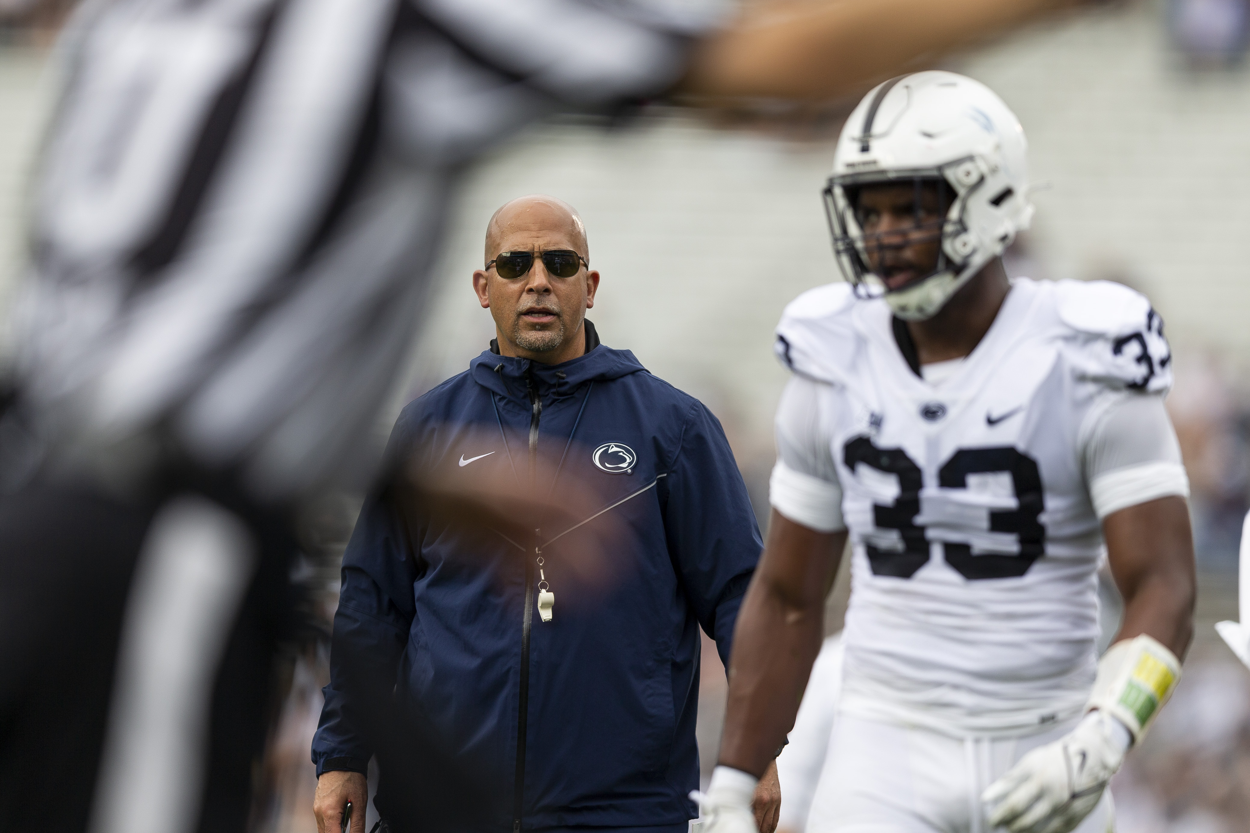 Penn State coach James Franklin talks to defensive end Dani Dennis-Sutton during the second quarter of the NCAA college football team's Blue-White spring game Saturday, April 15, 2023, in State College, Pa. 