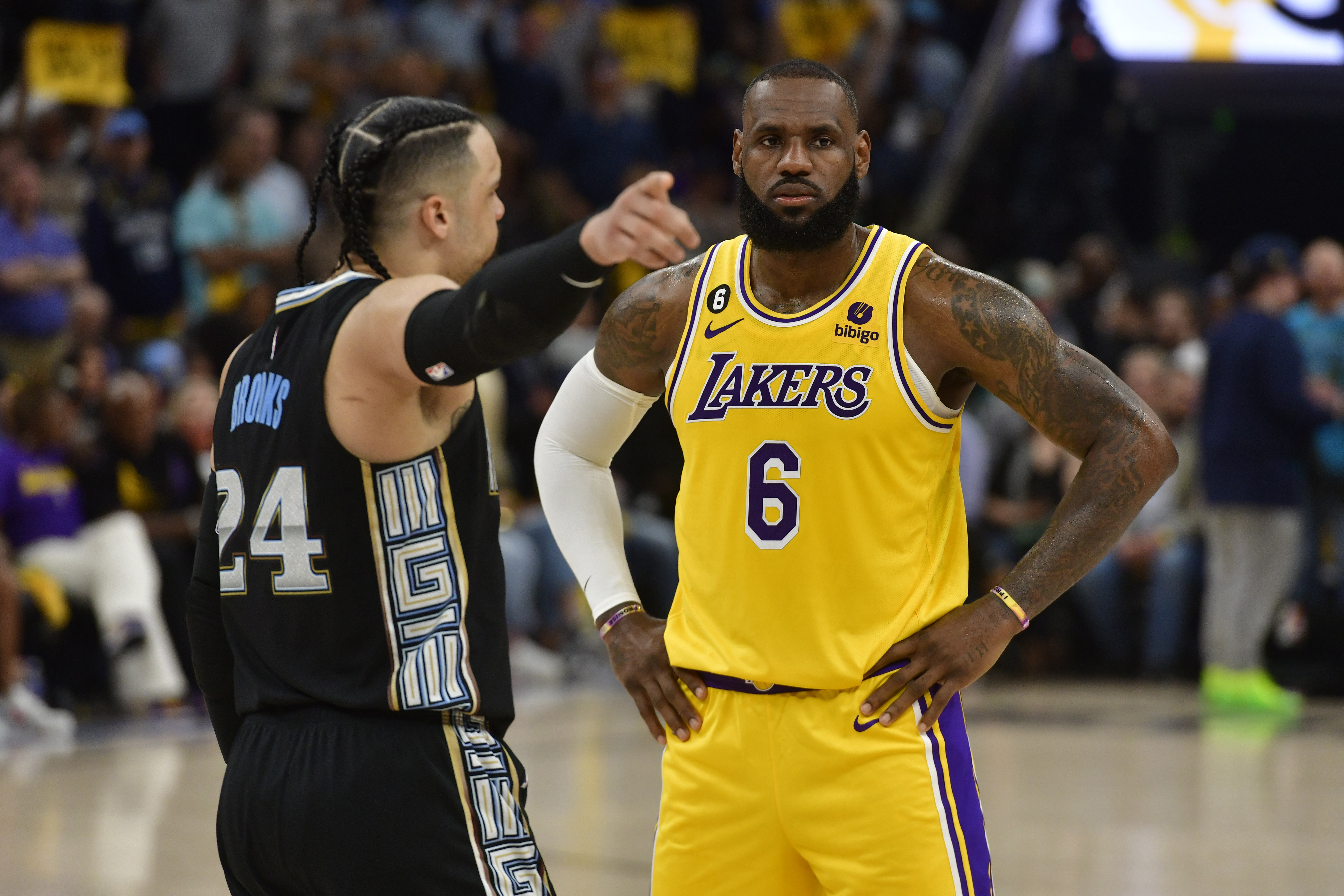 Memphis Grizzlies forward Dillon Brooks (24) talks to Los Angeles Lakers forward LeBron James (6) during the second half of Game 2 in a first-round NBA basketball playoff series Wednesday, April 19, 2023, in Memphis, Tenn. 