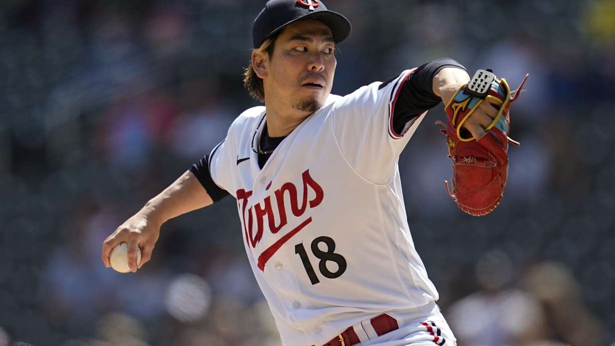 Minnesota Twins starting pitcher Kenta Maeda (18) delivers during the third inning of a baseball game against the Chicago White Sox, Monday, April 10, 2023, in Minneapolis.