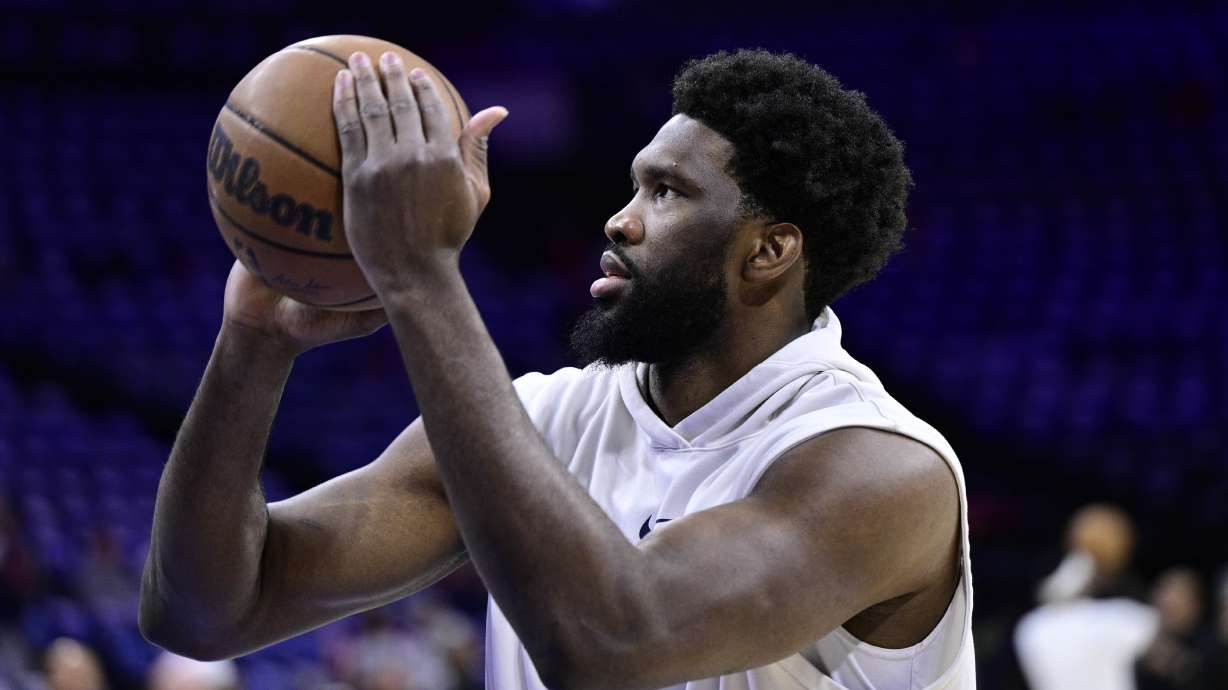 Philadelphia 76ers' Joel Embiid shoots during warmups before Game 2 in the first round of the NBA basketball playoffs against the Brooklyn Nets, Monday, April 17, 2023, in Philadelphia.