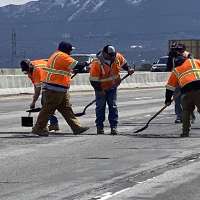 UDOT workers brave traffic and weather to fill potholes