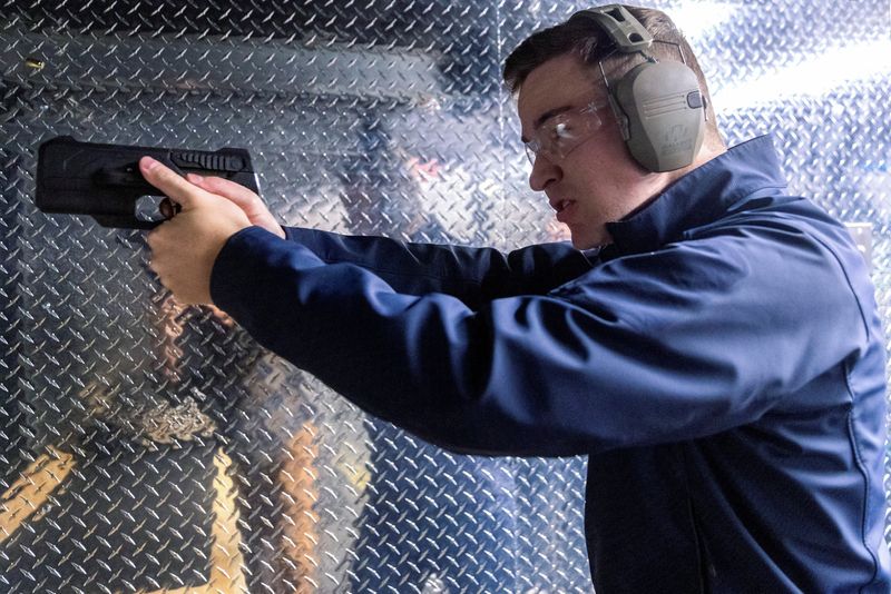 Kai Kloepfer, CEO and Founder of Biofire Technologies, fires a prototype of the Biofire Smart Gun inside the shooting range at the company's headquarters in Broomfield, Color.,  April 18, 2022.