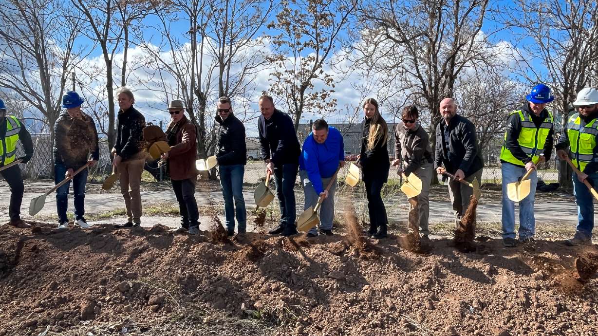 Executives of Rich Day Group and others involved in the SOHI Luxury Apartments project in Salt Lake City ceremoniously break ground on the project Thursday morning. The complex is expected to provide 153 units in the Granary District by the end of 2025.