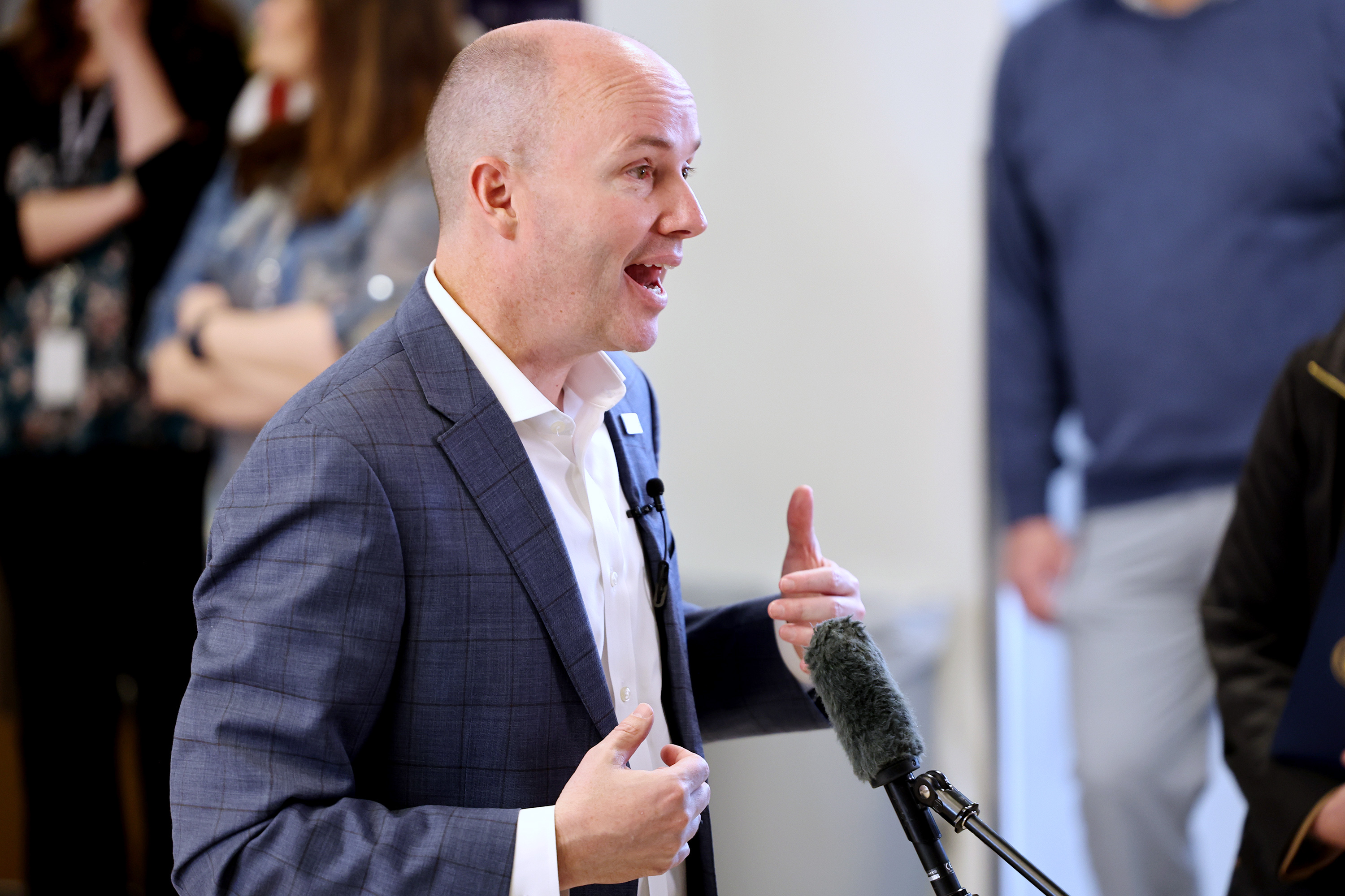 Gov. Spencer Cox talks at Tooele High School as he kicks off his Connecting Utah Tour on March 20. Cox says immigration reform is a vital step in strengthening the U.S. economy.