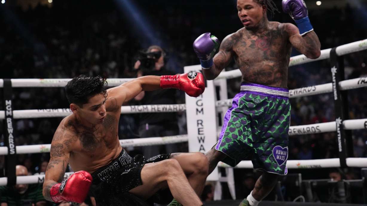 Gervonta Davis knocks down Ryan Garcia in a lightweight boxing bout Saturday, April 22, 2023, in Las Vegas.