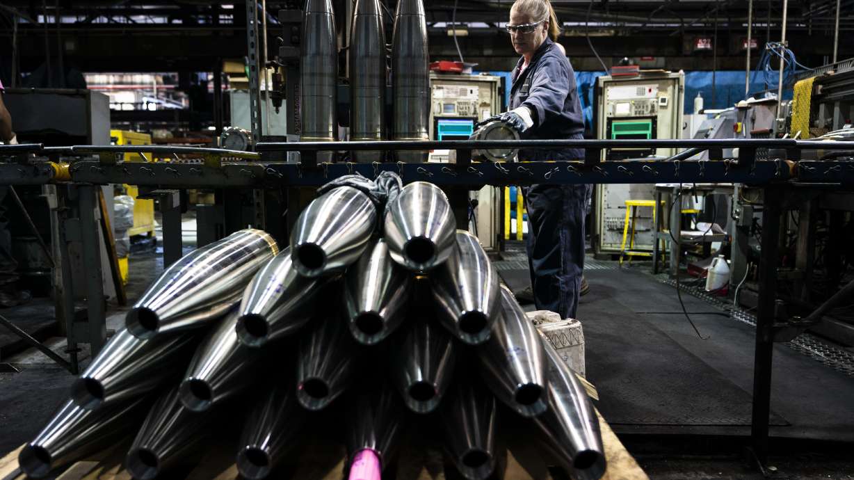A steel worker moves a 155 mm M795 artillery projectile at the Scranton Army Ammunition Plant in Scranton, Pa., April 13. One of the most important munitions of the Ukraine war comes from a historic factory in this city built by coal barons.