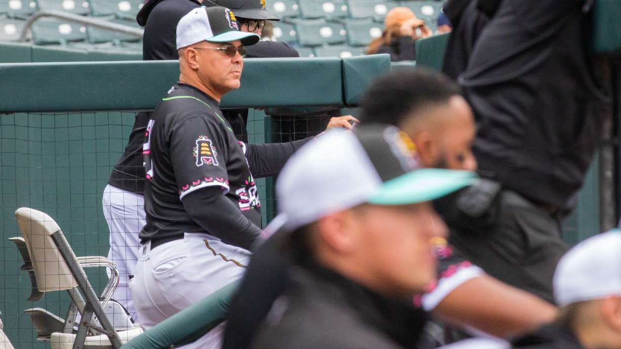 Salt Lake Bees manager Keith Johnson coaches his team during a 4-3 win over Reno at Smith's Ballpark on Saturday. Johnson became the team's all-time winningest manager earlier this month.