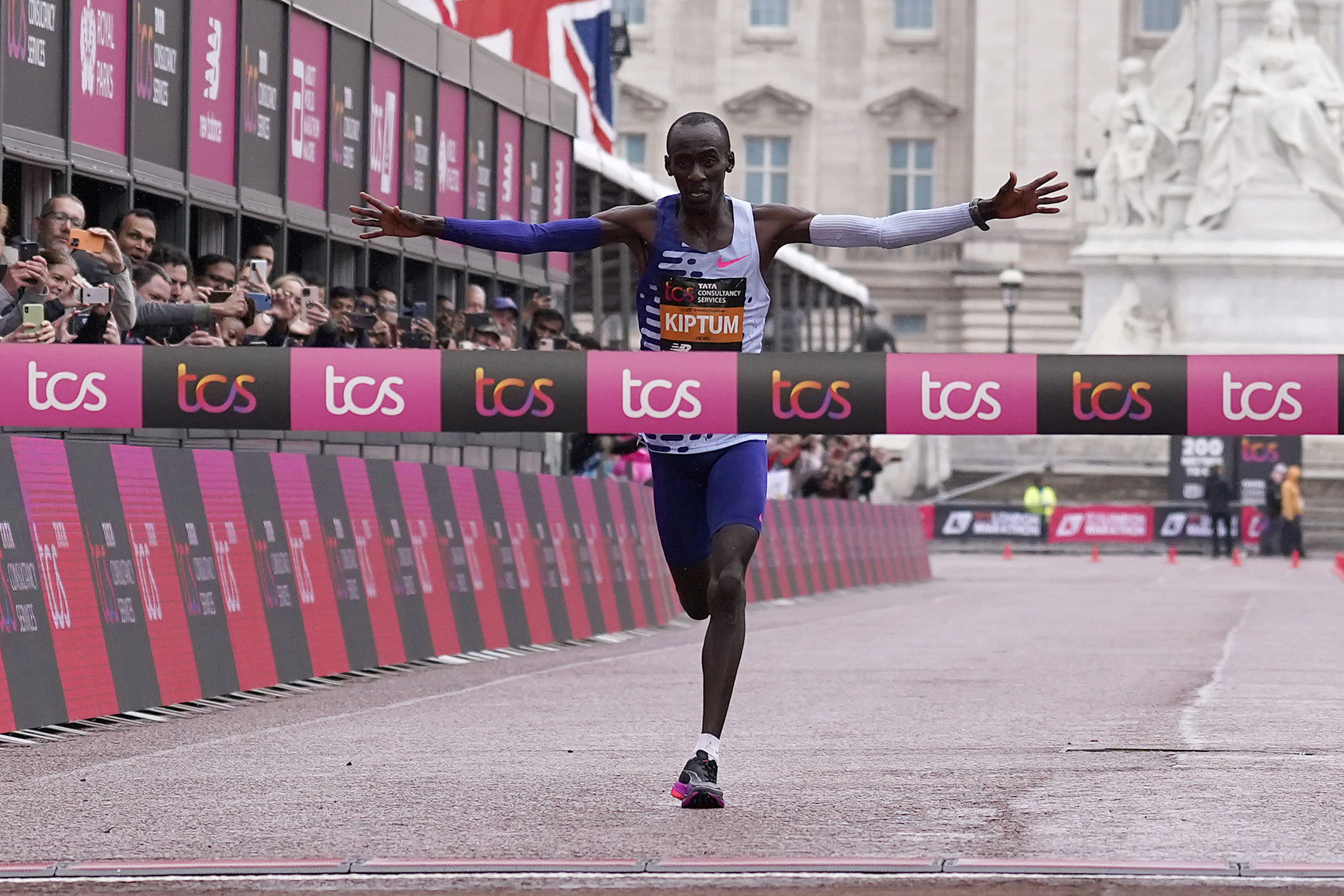 Kenya's Kelvin Kiptum crosses the finish line to win the men's race at the London Marathon in London, Sunday, April 23, 2023.