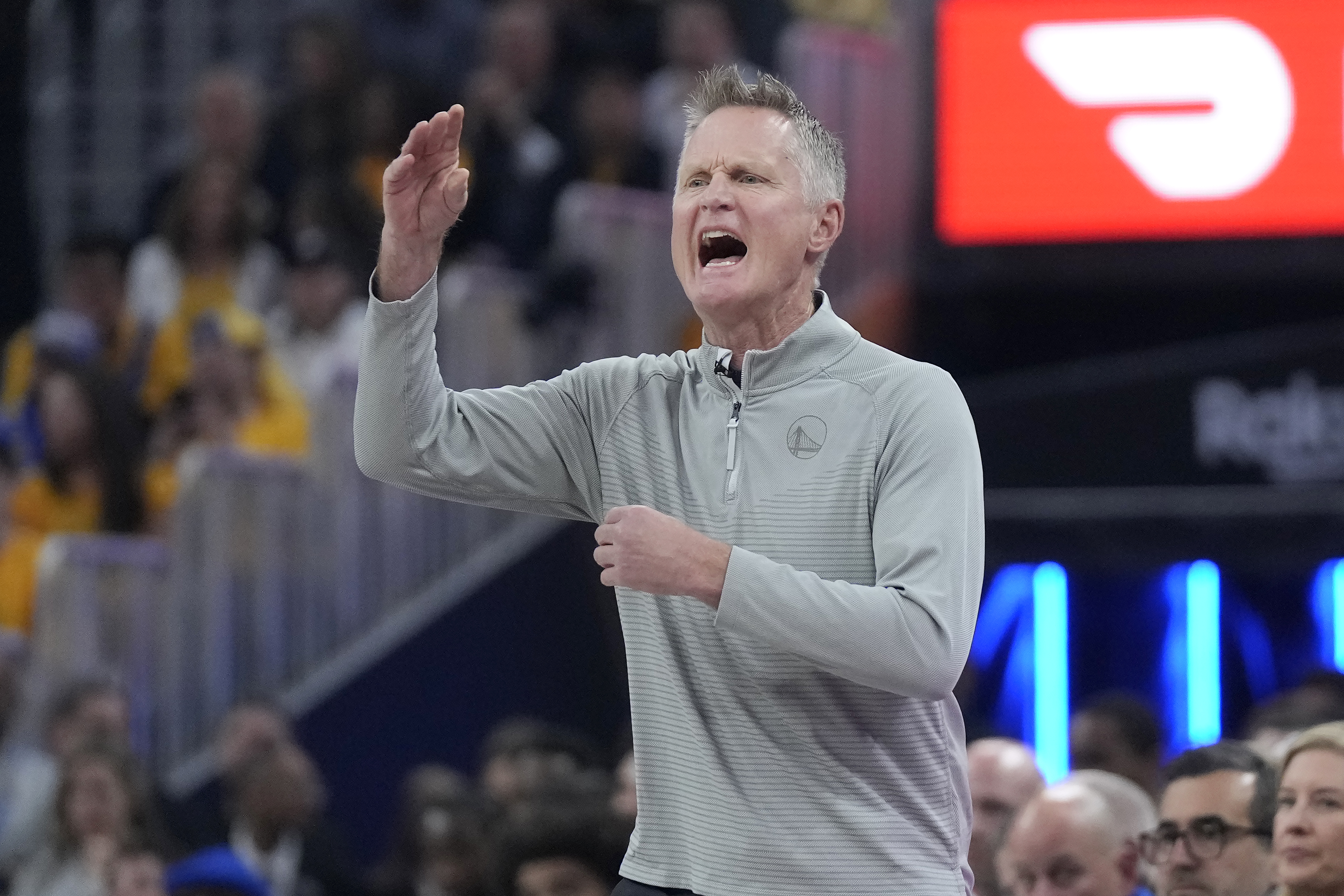 Golden State Warriors coach Steve Kerr gestures to players during the first half of Game 3 of the NBA basketball team's first-round playoff series against the Sacramento Kings in San Francisco, Thursday, April 20, 2023.