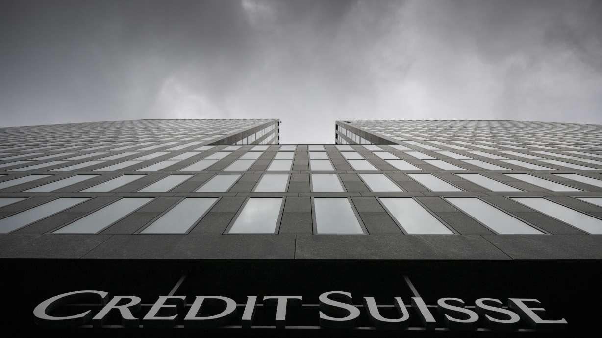 Grey clouds cover the sky over a building of the Credit Suisse bank in Zurich, Switzerland, on Feb. 21, 2022. In a report released last month, a team of researchers from Quebec and France say bacteria with antibiotic-resistant genes can spread through the clouds.