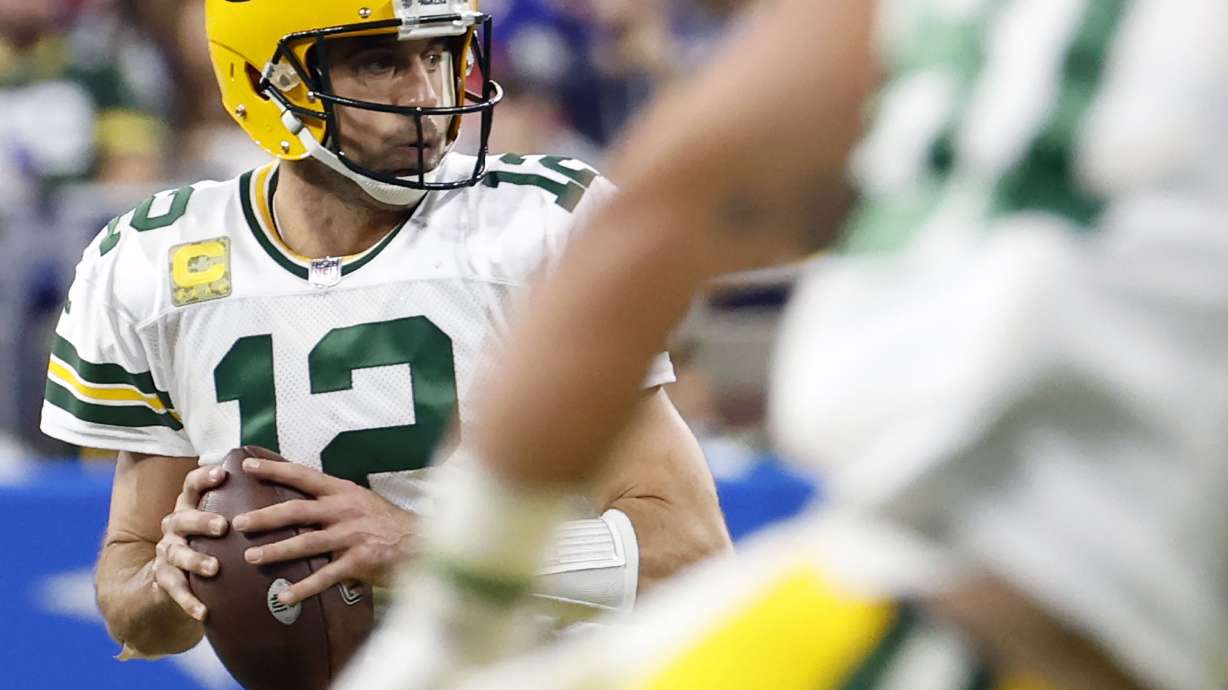 CORRECTS TO GREEN BAY PACKERS' AARON RODGERS NOT LIONS TIM BOYLE AND ADDS NEW SECOND SENTENCE - FILE - Green Bay Packers quarterback Aaron Rodgers (12) looks to pass in the second half against the Detroit Lions during an NFL football game Nov. 6, 2022, in Detroit. The New York Jets signed quarterback Tim Boyle to a one-year contract as a backup Thursday, April 6, 2023. Boyle served as a backup in Green Bay for three seasons to Rodgers who said last month his intention is to play for the Jets this season.