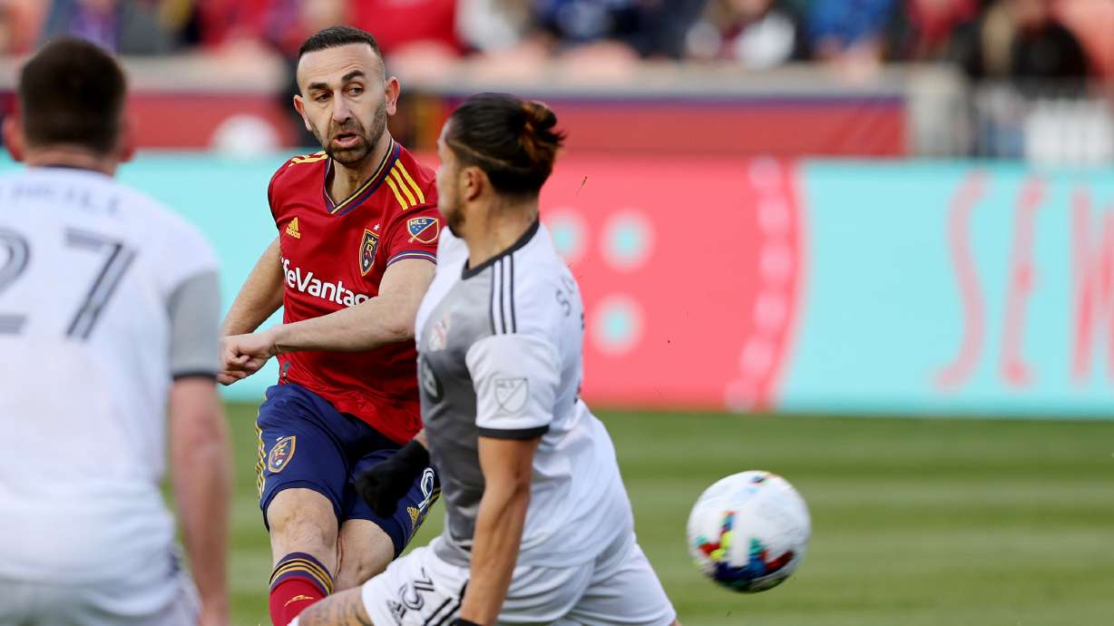 Real Salt Lake forward Justin Meram (9) kicks the ball past Toronto FC defender Carlos Salcedo (3) for a goal as Real Salt Lake and Toronto FC play at Rio Tinto Stadium in Sandy on Saturday, April 9, 2022.