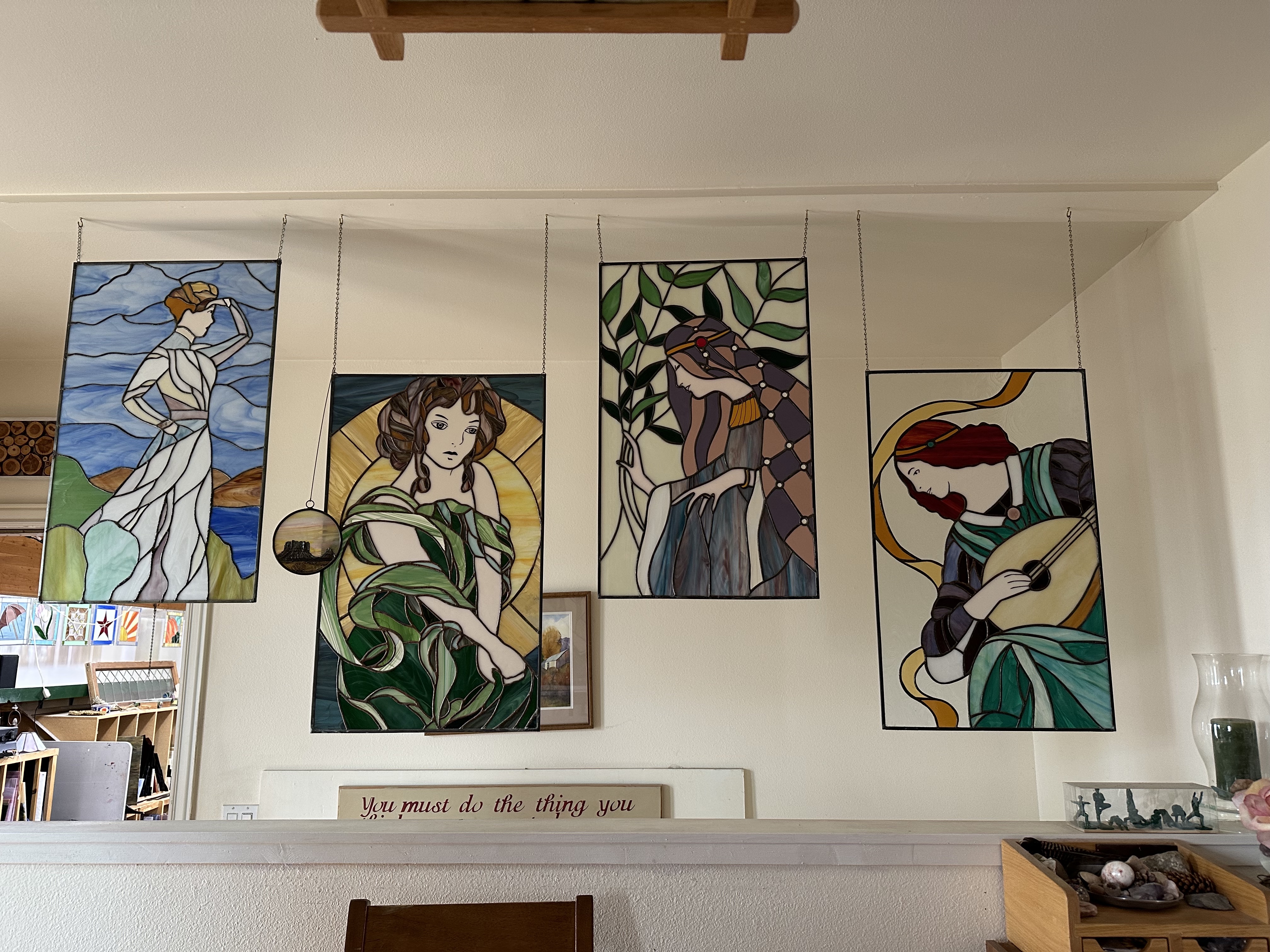 Stained glass artwork hangs inside Jeanne Gomm's home in Provo on April 18.