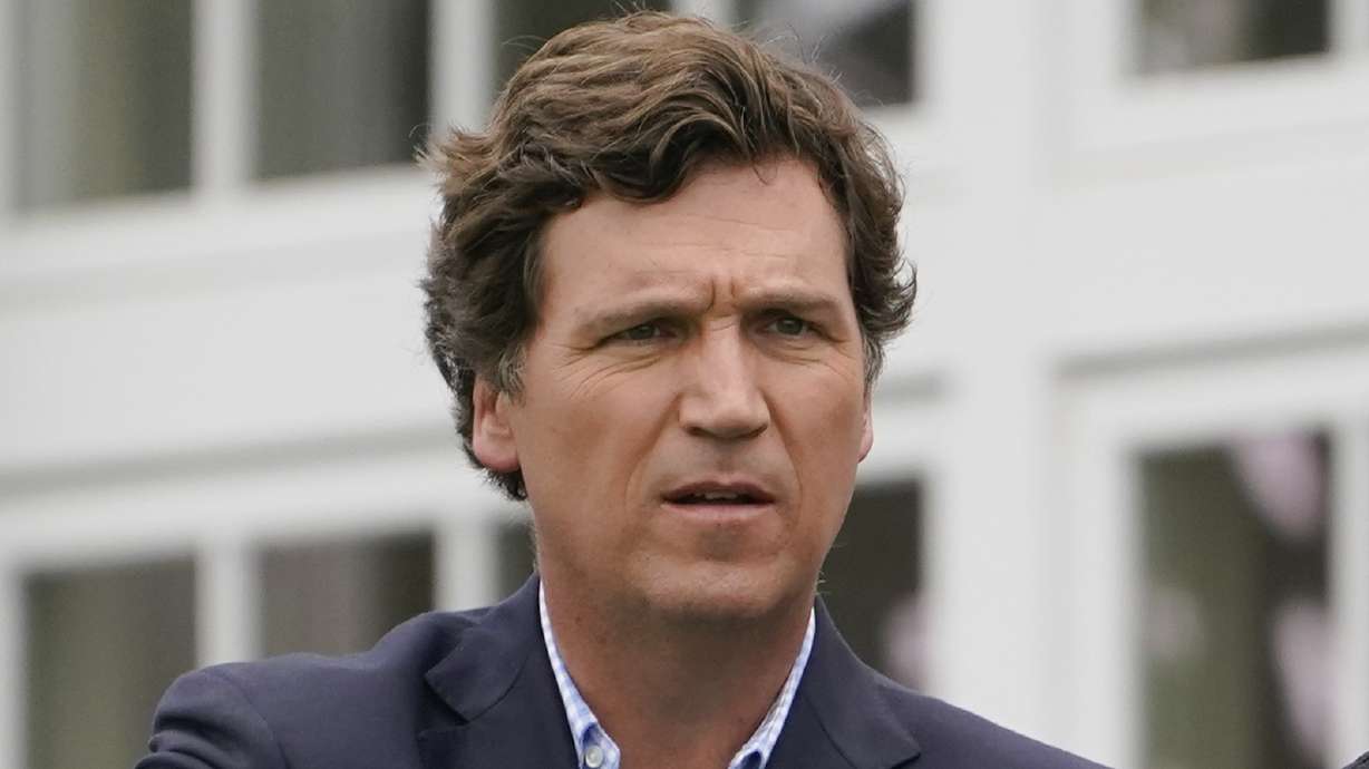 Tucker Carlson at the Bedminster Invitational LIV Golf tournament in Bedminster, N.J., July 31, 2022. Fox News says it has agreed to part ways with Carlson, less than a week after settling a lawsuit over the network’s 2020 election reporting.