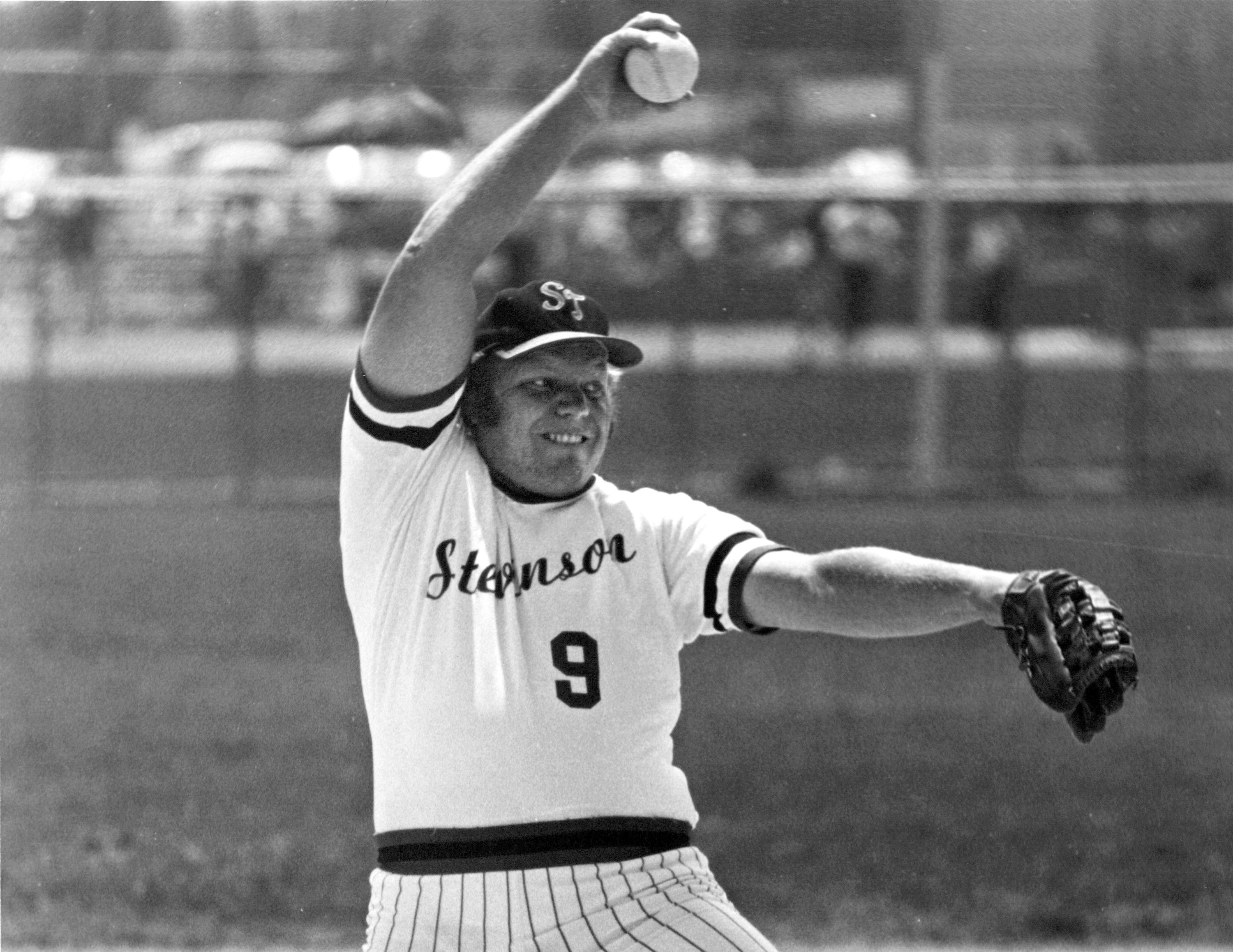 Larry H. Miller is winding up to pitch during a fast-pitch softball game in this undated photo. The company he founded is leading Utah's pitch for a Major League Baseball expansion team.