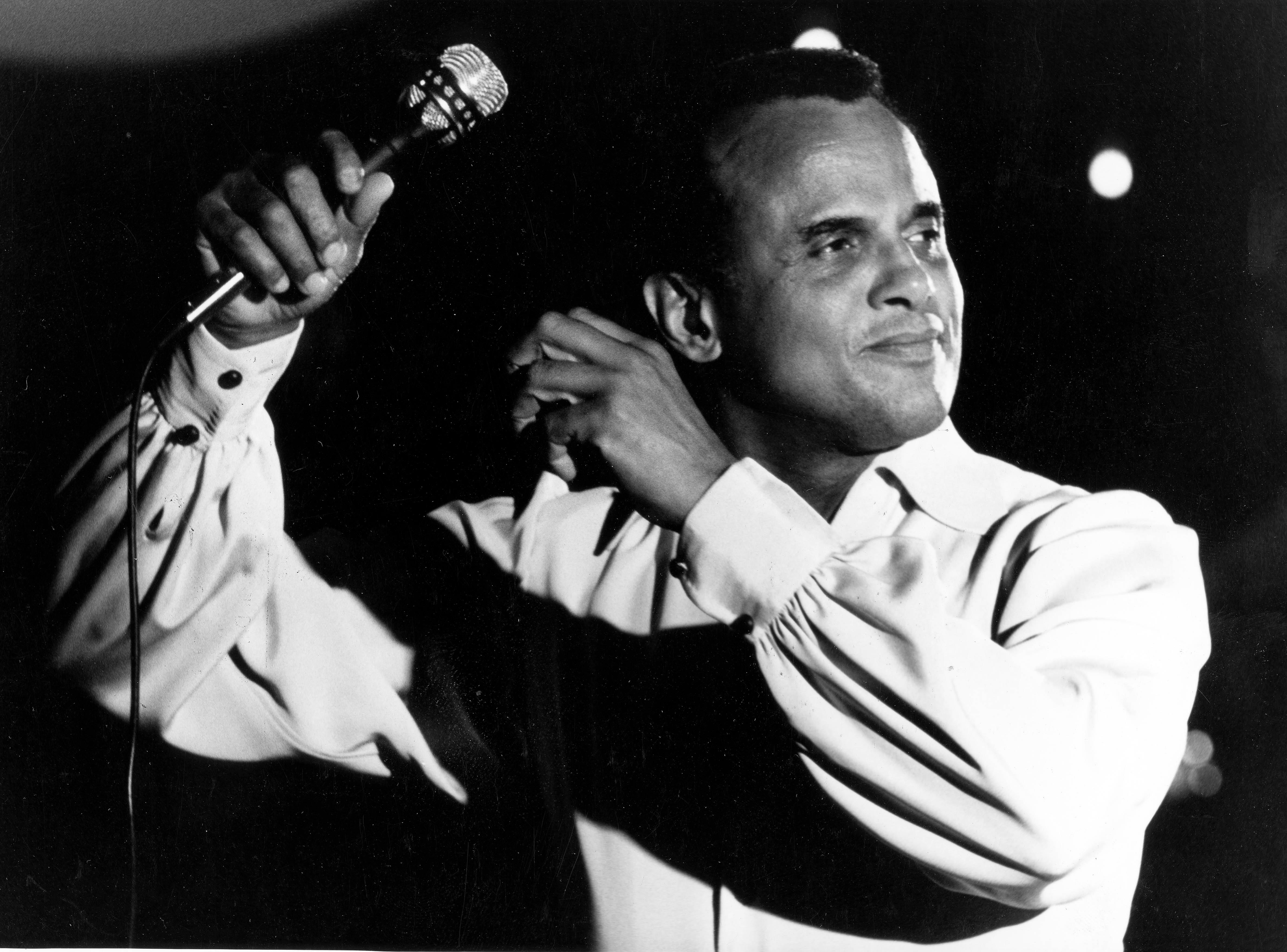 American Singer H Harry Belfonte is seen performing on Oct. 27, 1956, in New York. Belafonte has died at age 96.