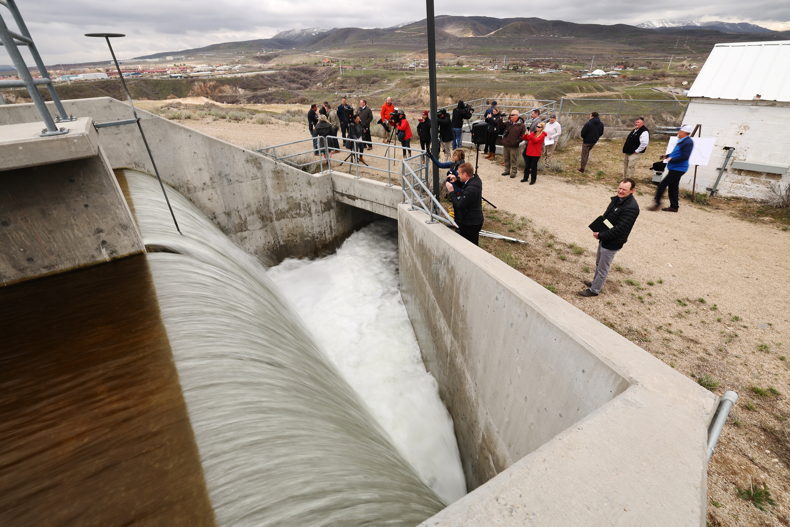 Water begins to flow at Point of the Mountain in Draper on Tuesday. The Central Utah Water Conservancy District is redirecting the water to the Great Salt Lake to help in the flood control effort and expects to divert 50 million gallons per day.