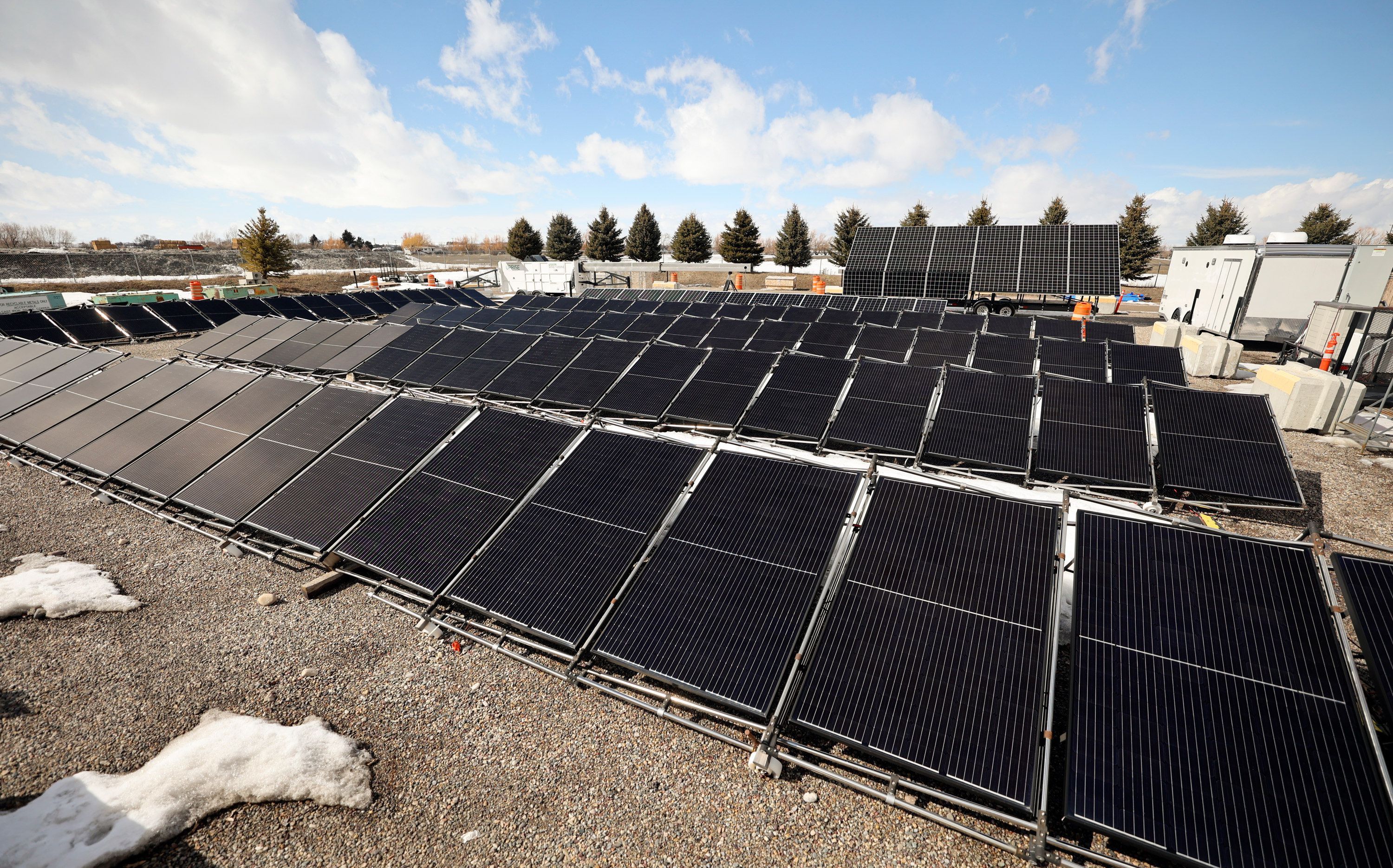 Solar panels that are part of a microgrid are picture outside of the INL Energy Systems Laboratory in Idaho Falls, Idaho, on April 5. The “grid-in-a-box” has solar panels that can be set up anywhere and attached to battery storage, housed in a portable shipping container.