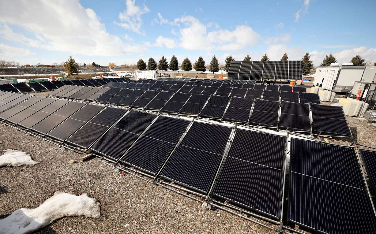 Solar panels that are part of a microgrid are picture outside of the INL Energy Systems Laboratory in Idaho Falls, Idaho, on April 5. The “grid-in-a-box” has solar panels that can be set up anywhere and attached to battery storage, housed in a portable shipping container.
