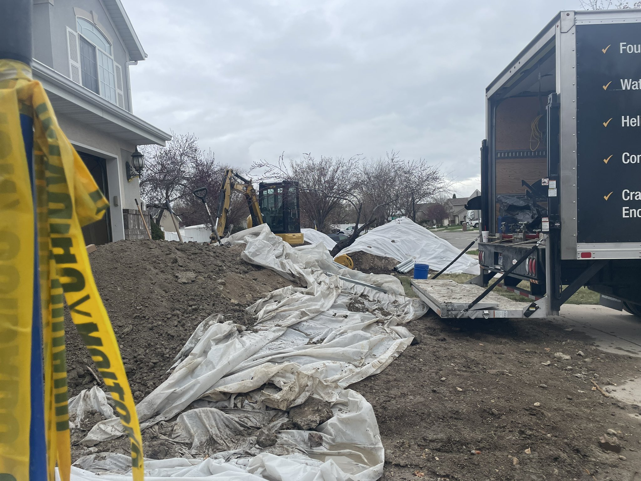 Bryan Bradbury's home in Woods Cross is under repair Tuesday after it has been sinking.