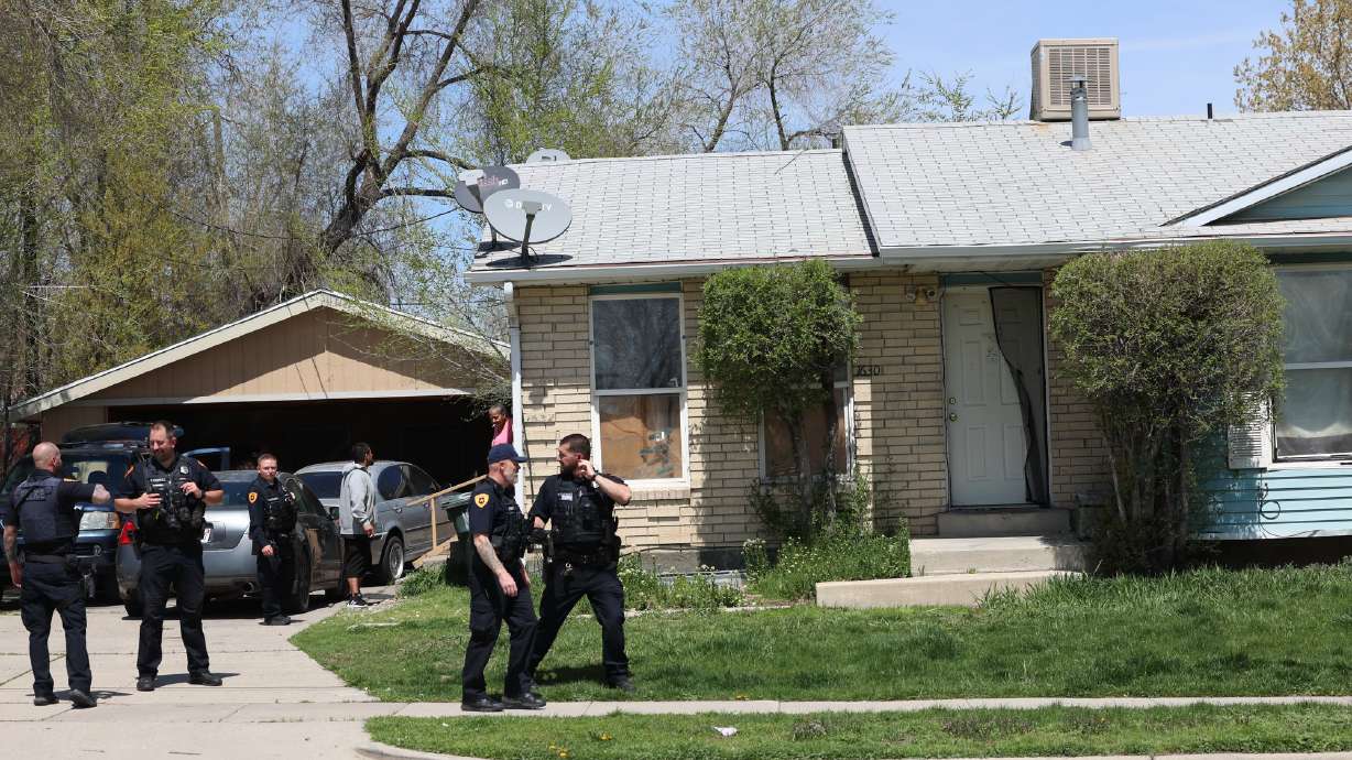 Salt Lake police investigate the fatal shooting of a teen girl inside a house near 1600 West and 500 South in Salt Lake City on Wednesday. The victim's teenage brother was later arrested in the shooting.