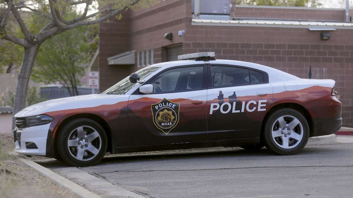 A man was charged Wednesday with attempted murder and other charges after police say he attacked two people who were walking their dogs in Moab, stabbing one of the victims.