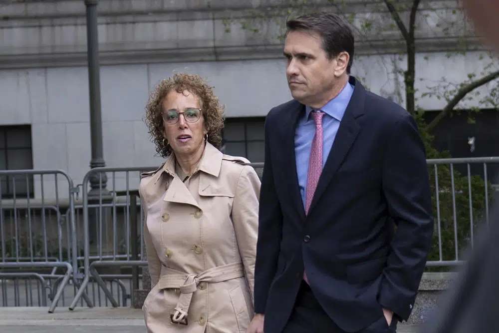 Former President Donald Trump's lawyer Susan Necheles, left, walks into the courthouse Tuesday in New York. A jury of six men and three women was chosen Tuesday to hear a former advice columnist E. Jean Carroll’s lawsuit accusing former Trump of raping her in the 1990s.