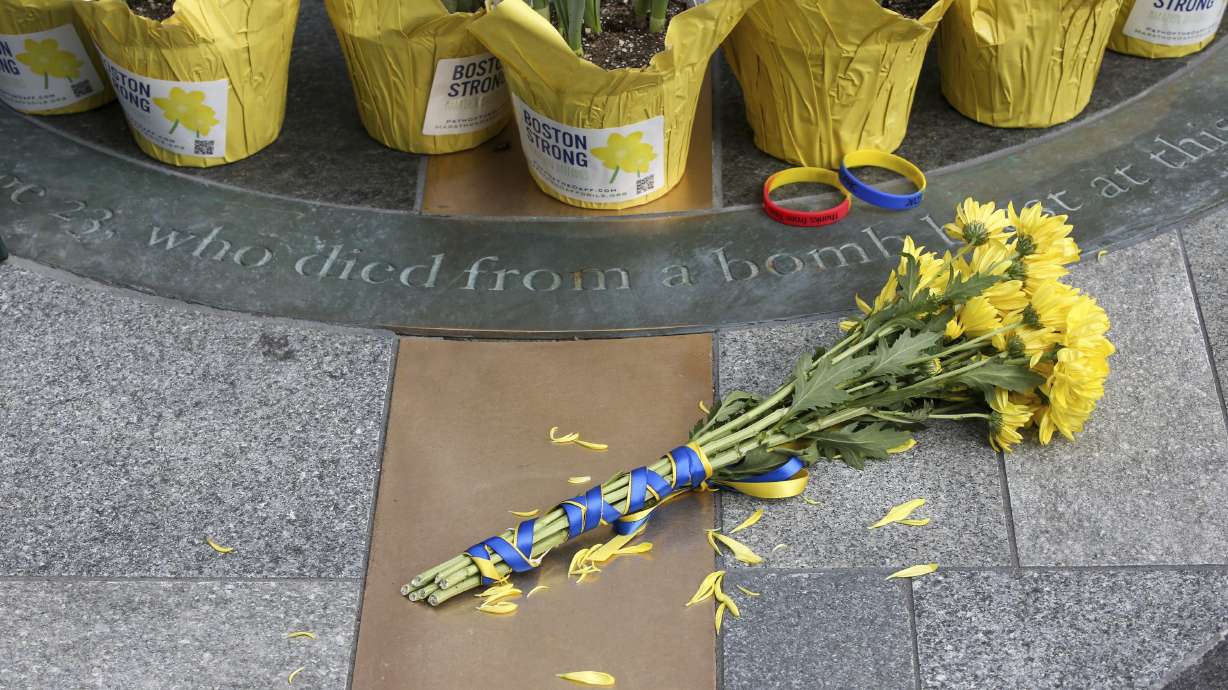 Flowers are placed at a memorial for victims of the 2013 Boston Marathon bombing on the 10th anniversary of the attack April 15 in Boston. A Senate subcommittee is assessing the nation’s preparedness for threats like the 2013 attack.