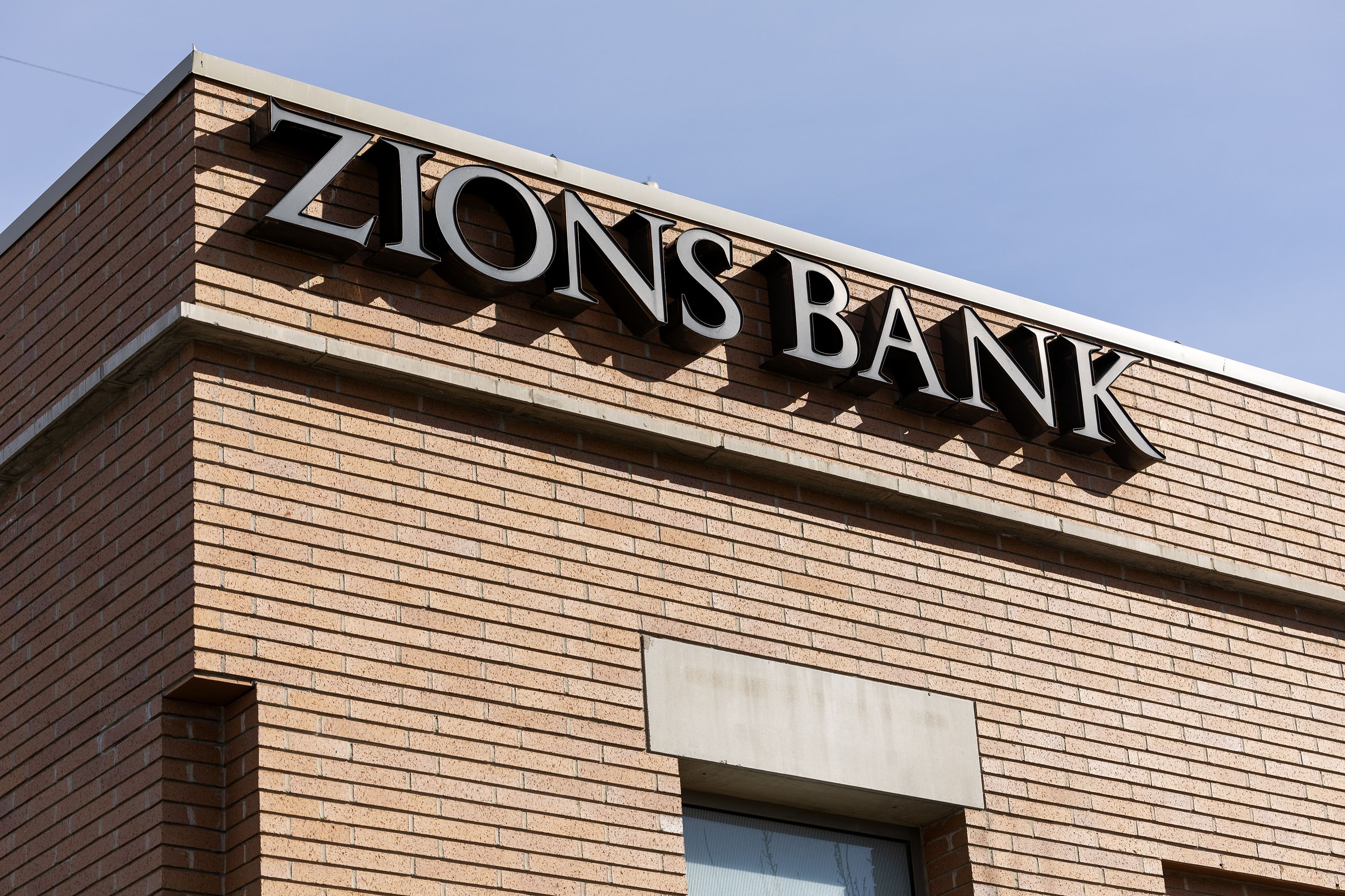 A Zions Bank branch at 7015 South Highland Dr. in Cottonwood Heights on March 14. Zions pushes back on Moody's report, which downgraded its rating.