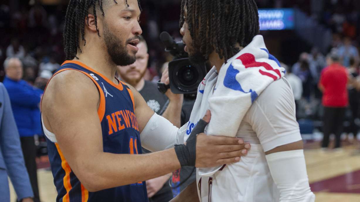 New York Knicks' Jalen Brunson (11) talks with Cleveland Cavaliers' Darius Garland (10) after the Knicks' 106-95 win in Game 5 of an NBA basketball first-round playoff series Wednesday, April 26, 2023, in Cleveland. The Knicks won the series.