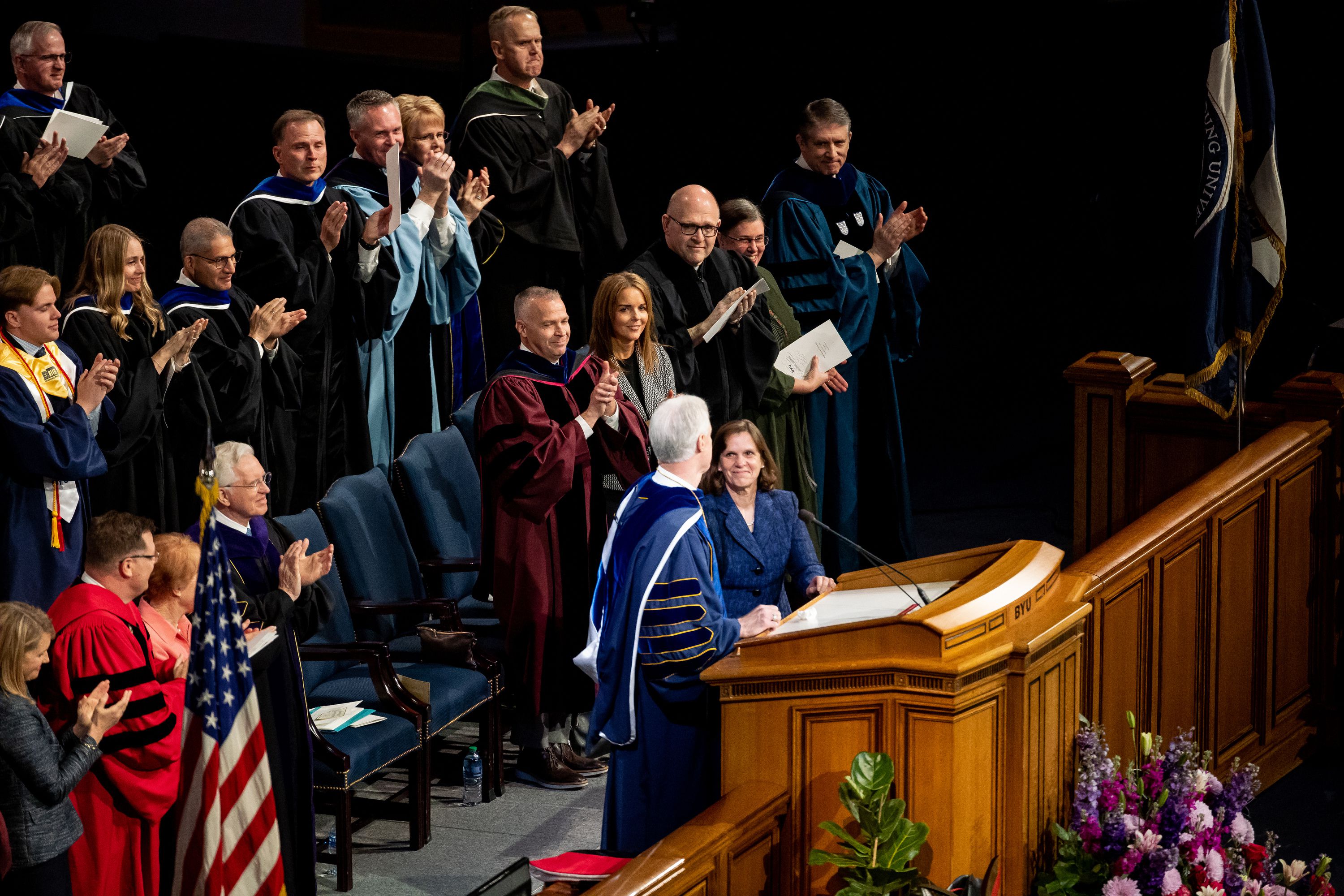 Brigham Young University President Kevin J Worthen shares a moment with his wife, Peggy Sealey Worthen, while he speaks at the university’s commencement at the Marriott Center in Provo on Thursday.
