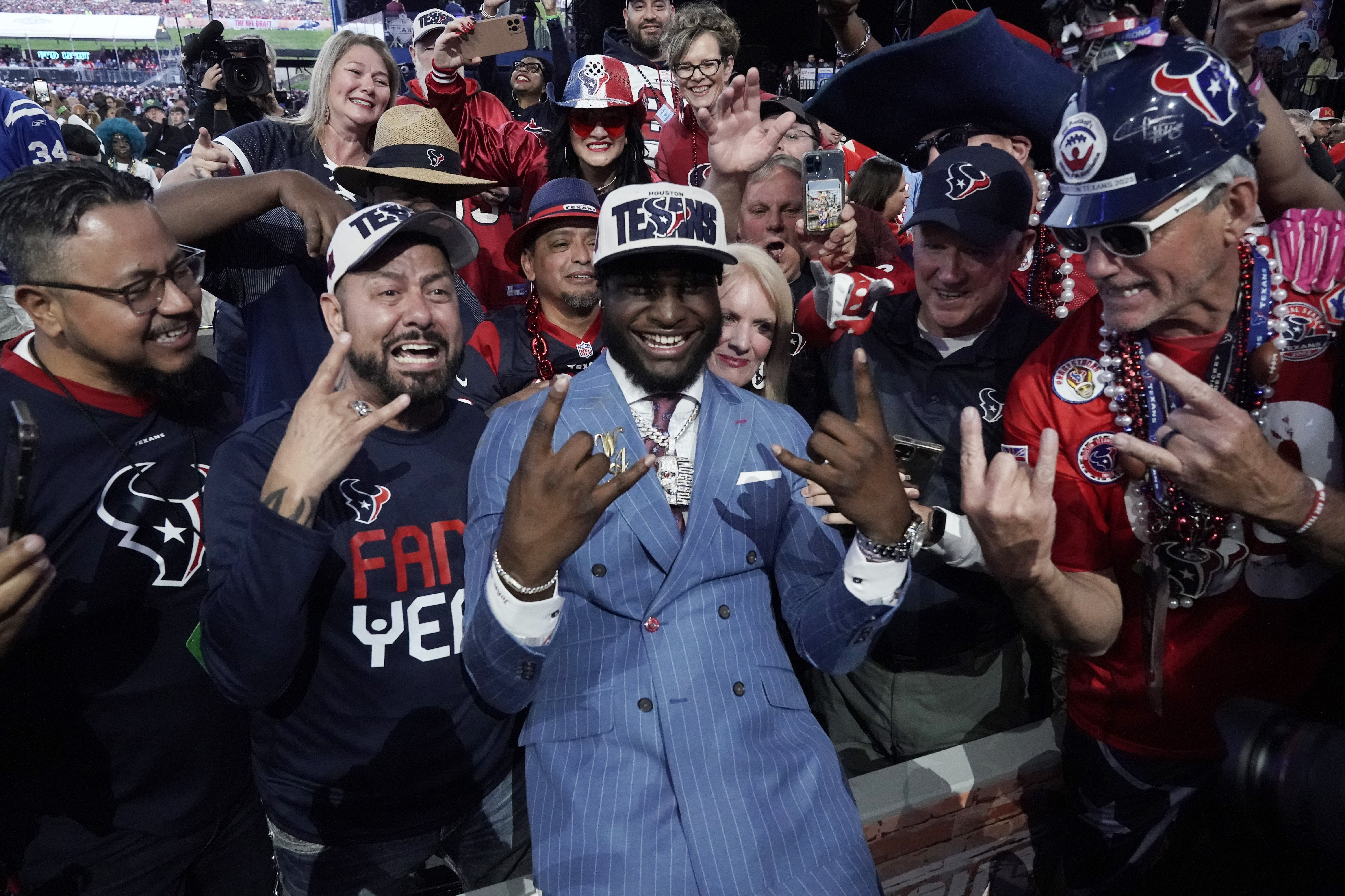 Alabama linebacker Will Anderson Jr. celebrates with fans after being chosen by the Houston Texans with the third overall pick during the first round of the NFL football draft, Thursday, April 27, 2023, in Kansas City, Mo. 