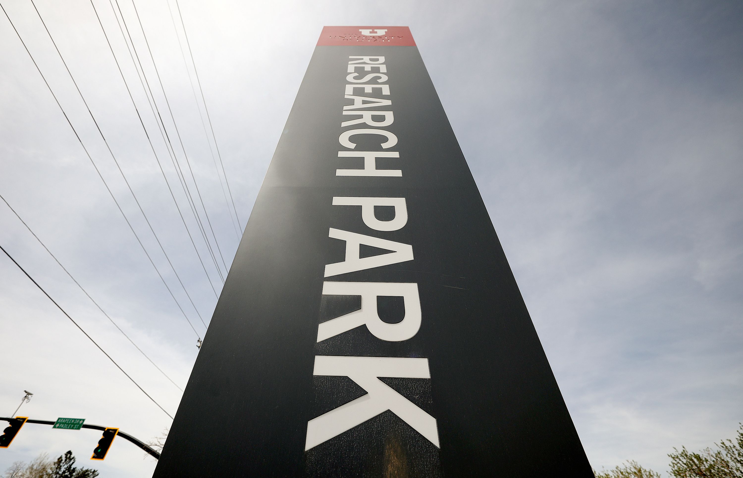 A sign for the University of Utah’s Research Park is pictured in Salt Lake City on Thursday. Sens. Mike Lee and Mitt Romney, R-Utah, have reintroduced legislation to remove the federal government's "reversionary interest" on the University of Utah's Research Park.