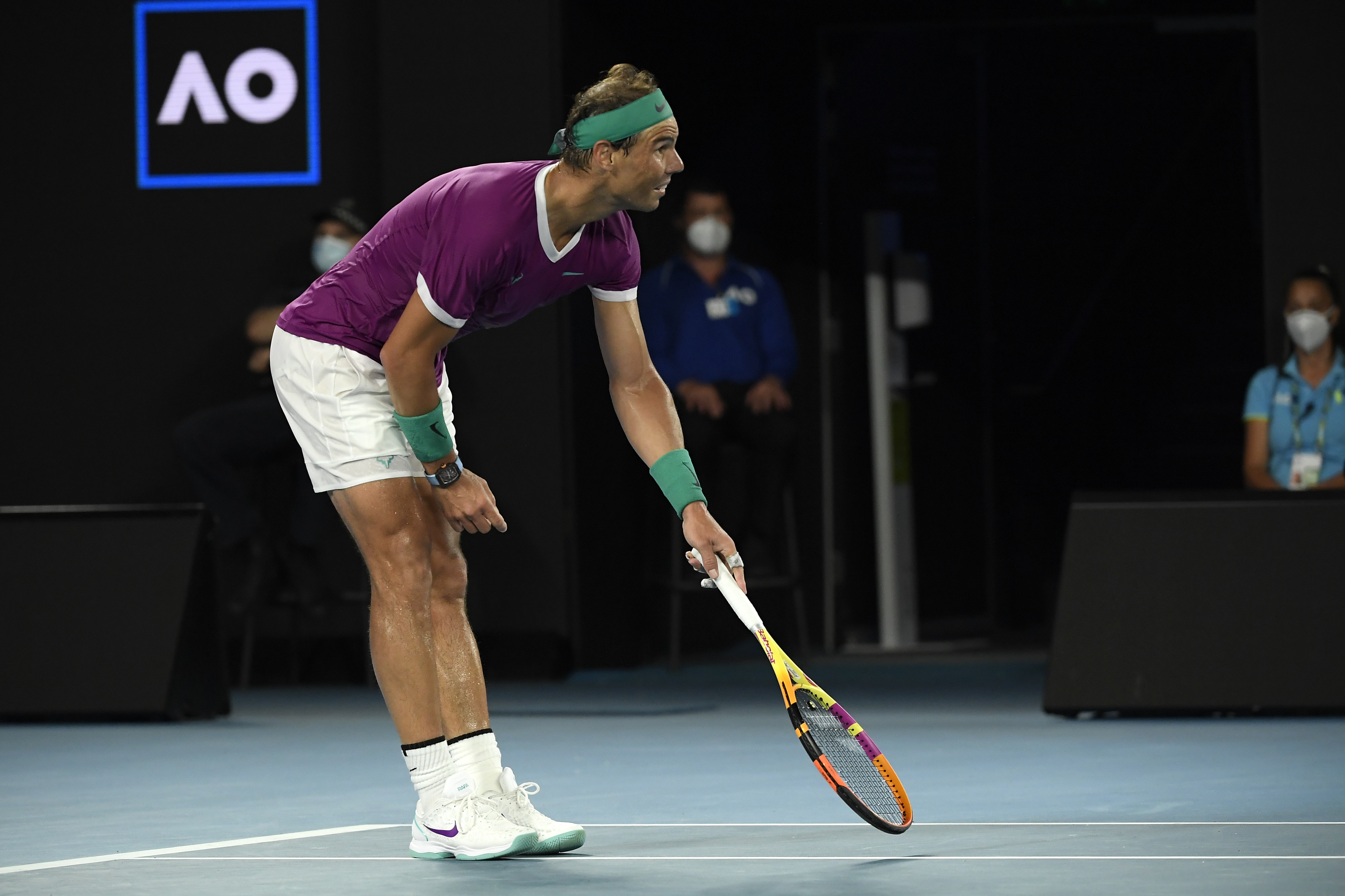 FILE - Rafael Nadal of Spain gestures to the umpire a he queries a line call during his match against Daniil Medvedev of Russia in the men's singles final at the Australian Open tennis championships in Melbourne, Australia, Sunday, Jan. 30, 2022. There won’t be any more arguing with line judges over calls at any tennis tournaments on the ATP men’s tour as of 2025 — because there won’t be any more line judges at any of those events by then. The London-based ATP announced Friday, April 28, 2023, that it will use Electronic Line Calling Live — known as ELC Live — for all “Out” calls in all matches beginning two years from now.