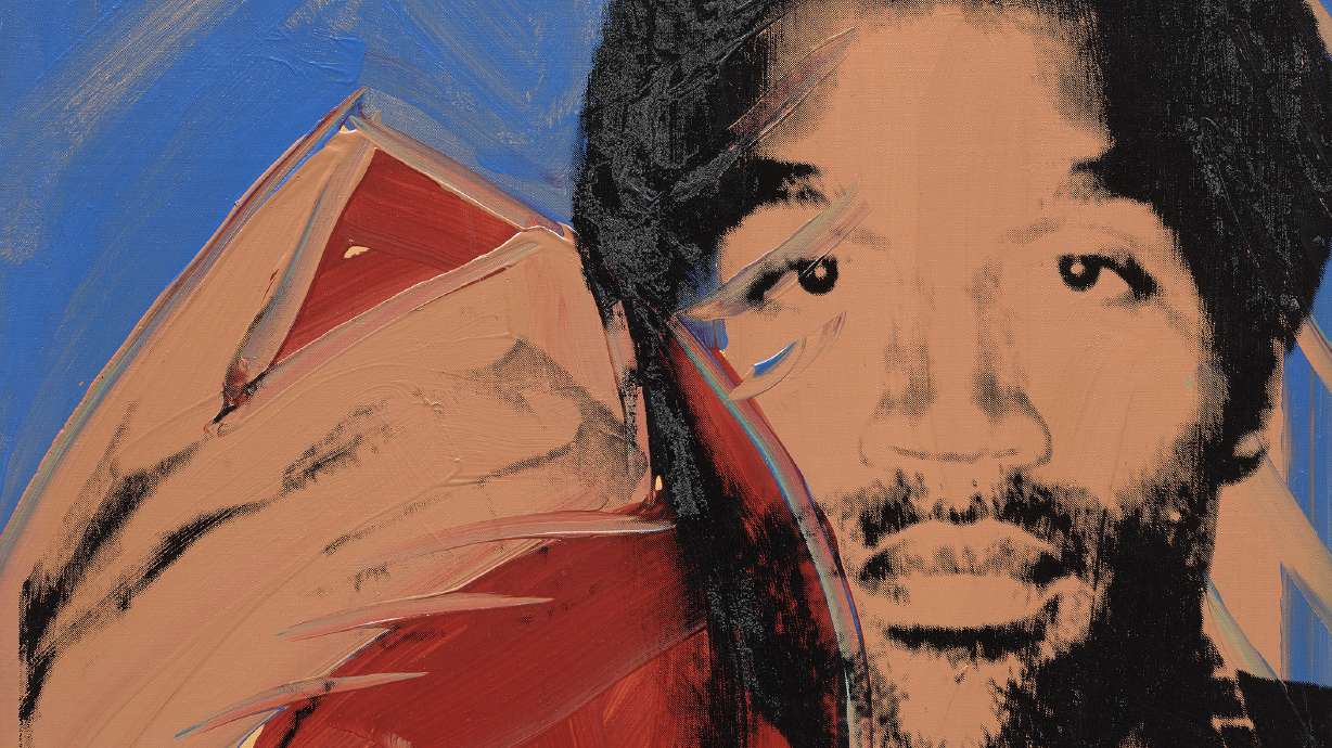 This image released by Phillips shows "O.J. Simpson," an acrylic and silkscreen ink on canvas portrait of the Buffalo Bills running back in 1977. The portrait, which was in the collection of the Pro Football Hall of Fame and deaccessioned in 2011, will be auctioned, will be auctioned in New York on May 16.