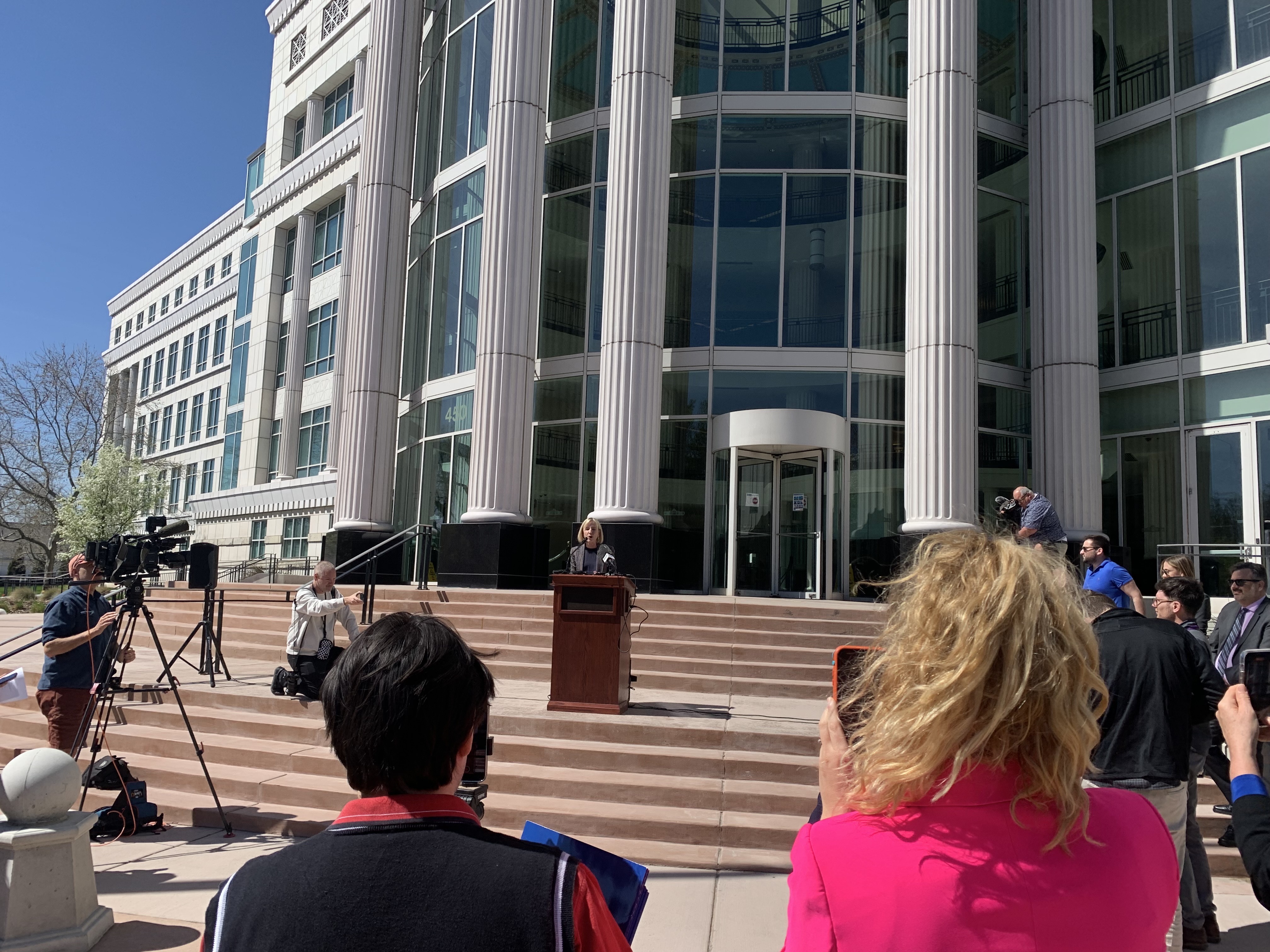 Sarah Stoesz, interim CEO of Planned Parenthood Association of Utah, speaks outside the Matheson Courthouse on Friday after a hearing about a Utah law that bans clinics from providing abortions.