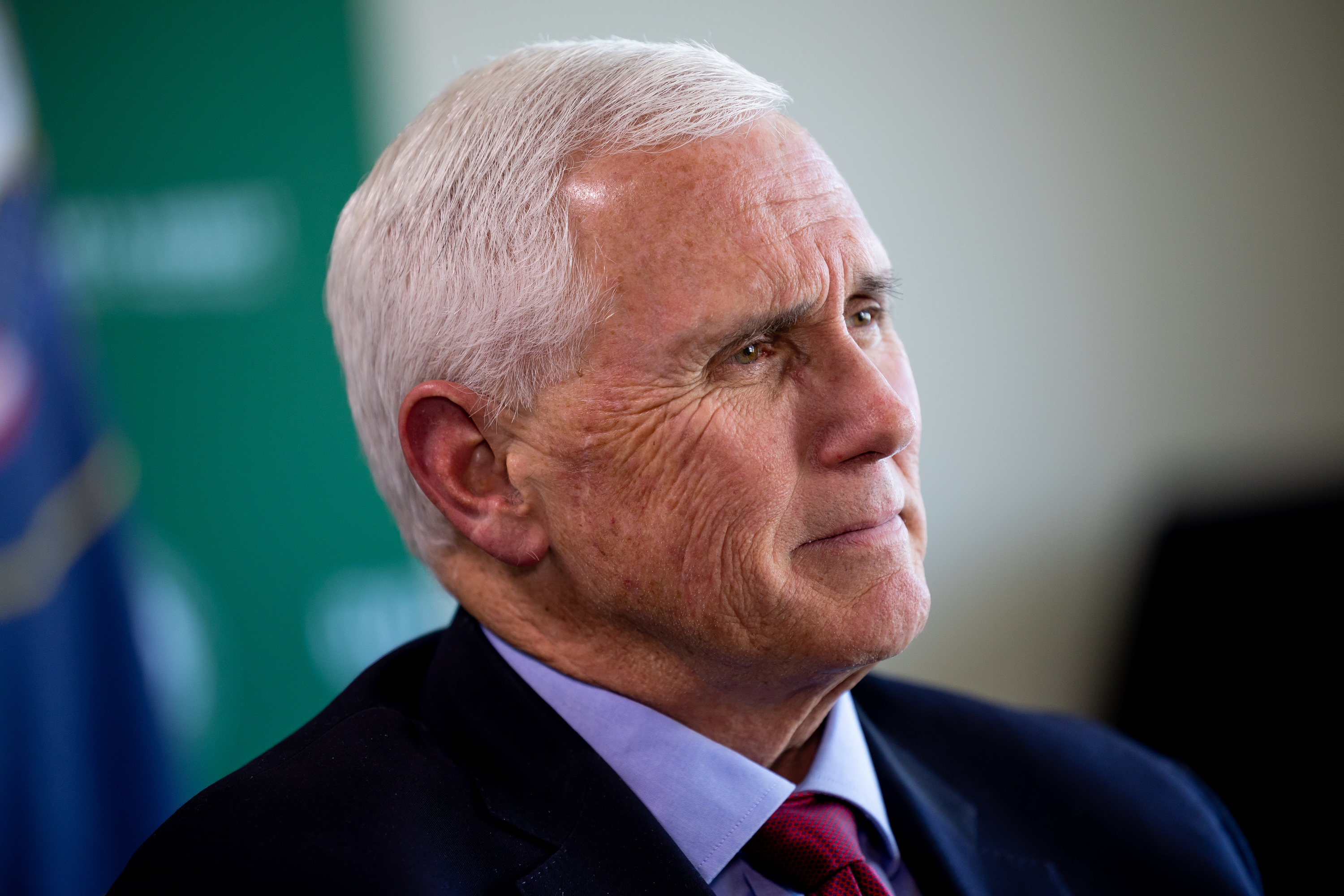 Former Vice President Mike Pence talks to journalists during an interview after speaking at an event in Salt Lake City on Friday.