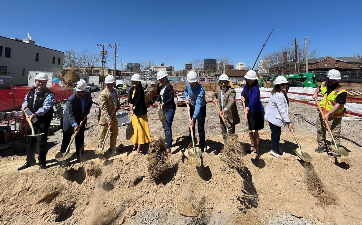 Developer Peter Corroon, left, as well as Salt Lake city and county leaders, and others ceremonially break ground on the 144 South Project on Friday.