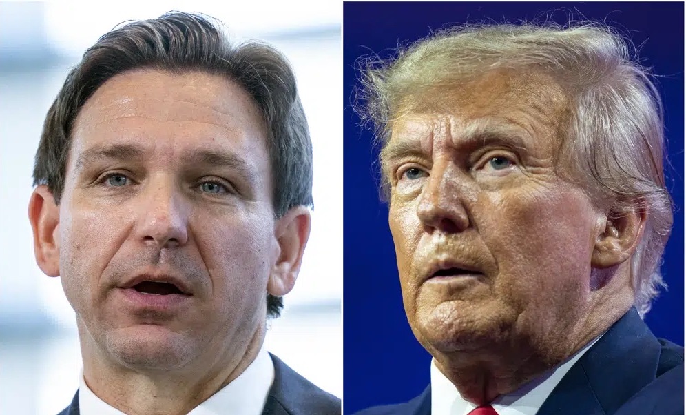 This combination of photos shows Florida Gov. Ron DeSantis speaking on April 21 in Oxon Hill, Md., left, and former President Donald Trump speaking on March 4, at National Harbor in Oxon Hill, Md. The competition between Trump and DeSantis is intensifying.