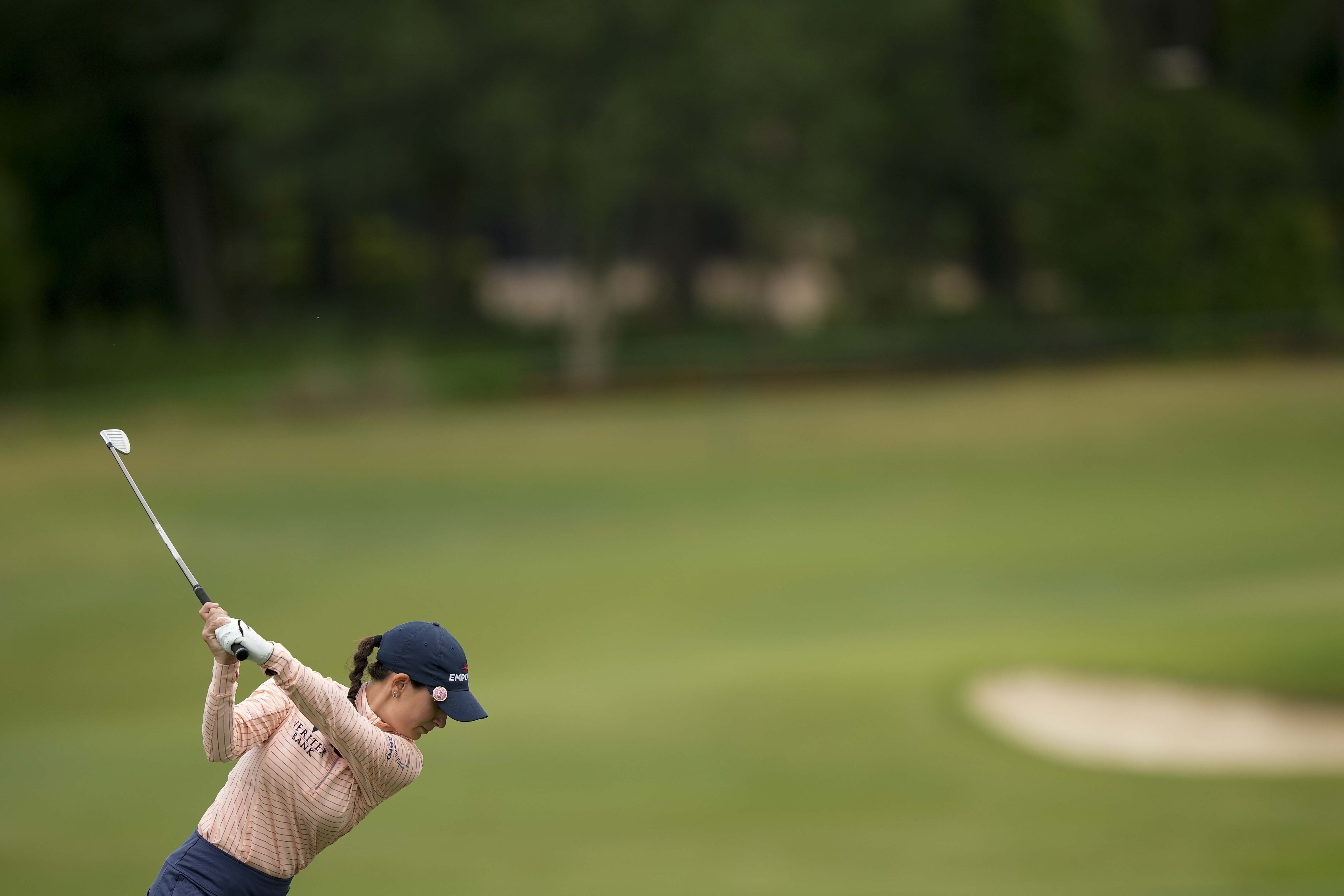 Cheyenne Knight hits her tee shot on the 12th hole during the second round of the Chevron Championship women's golf tournament at The Club at Carlton Woods on Friday, April 21, 2023, in The Woodlands, Texas. 