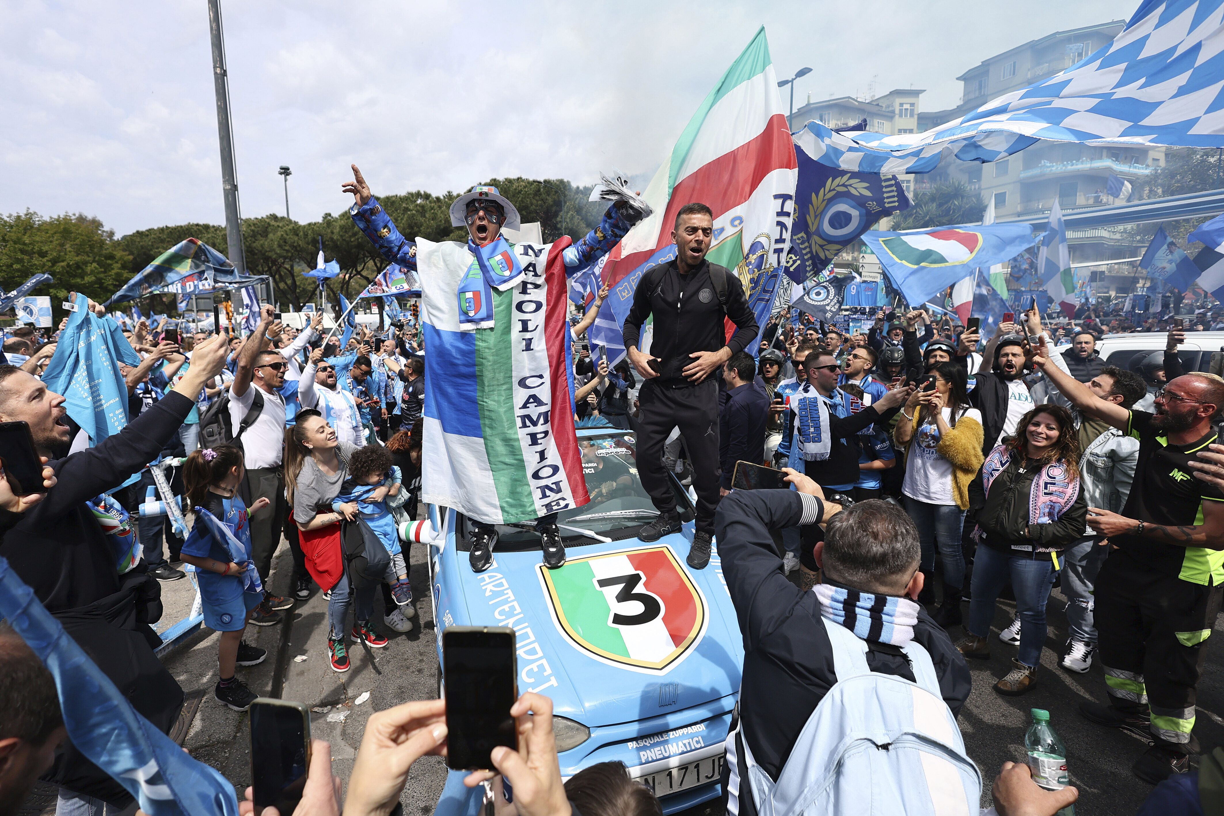 Napoli fans celebrate ahead of a Serie A soccer match between Napoli and Salernitana, in Naples, Italy, Sunday, April 30, 2023. Napoli could end a wait of more than three decades for the Serie A title. Napoli will know the permutations before its match against Salernitana. If second-placed Lazio fails to win at Inter Milan earlier in the day, then a Napoli win will clinch the scudetto. 