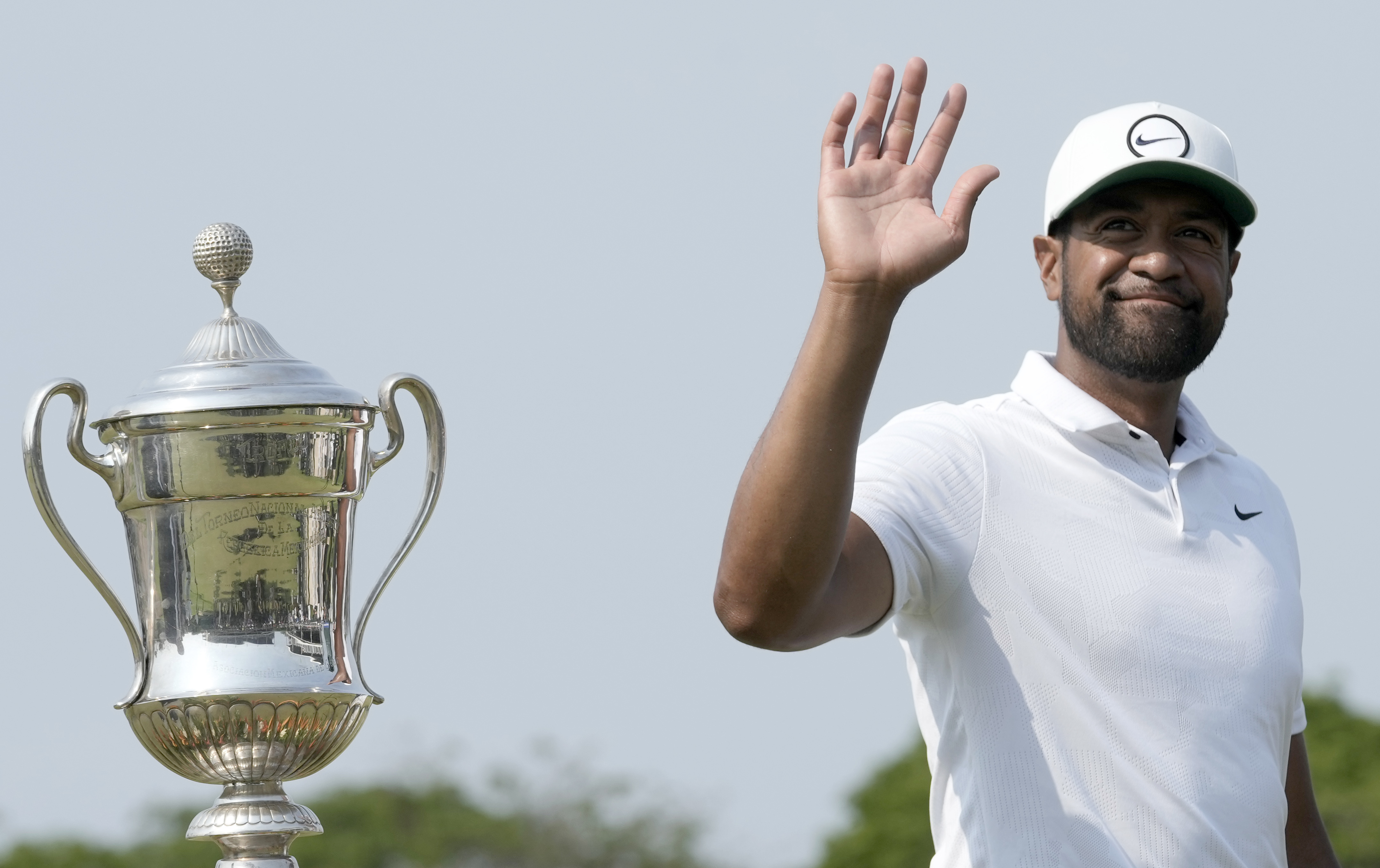 Tony Finau of the United States celebrates his victory in the Mexico Open golf tournament's final round in Puerto Vallarta, Mexico, Sunday, April 30, 2023. 