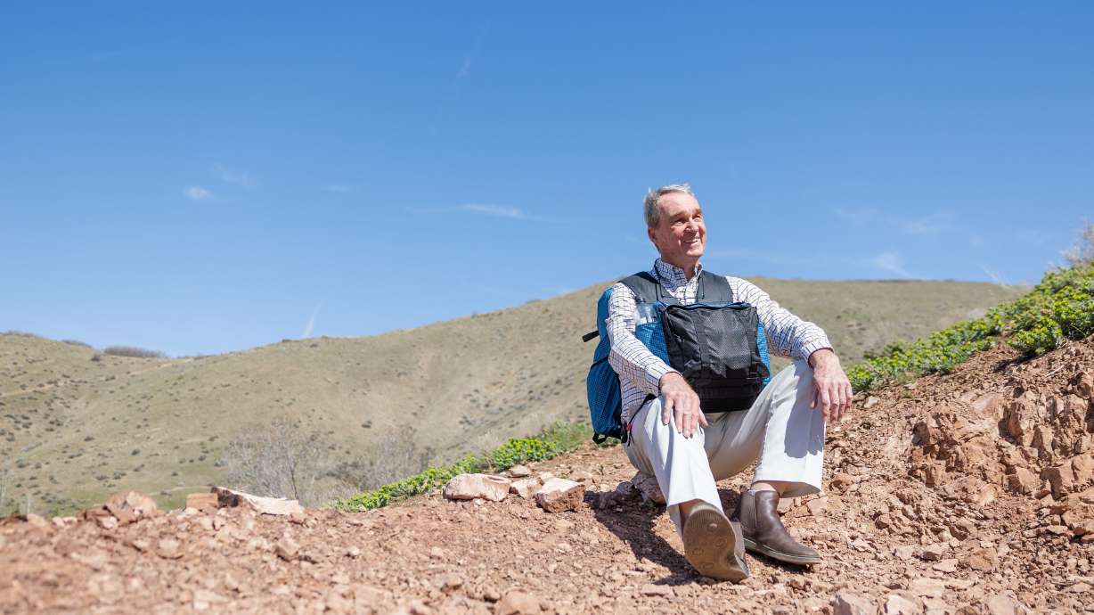 Avid hiker Richard Jones along the Bonneville Shoreline Trail in the foothills above Salt Lake City on April 17. He is set to complete the Triple Crown of hiking soon.