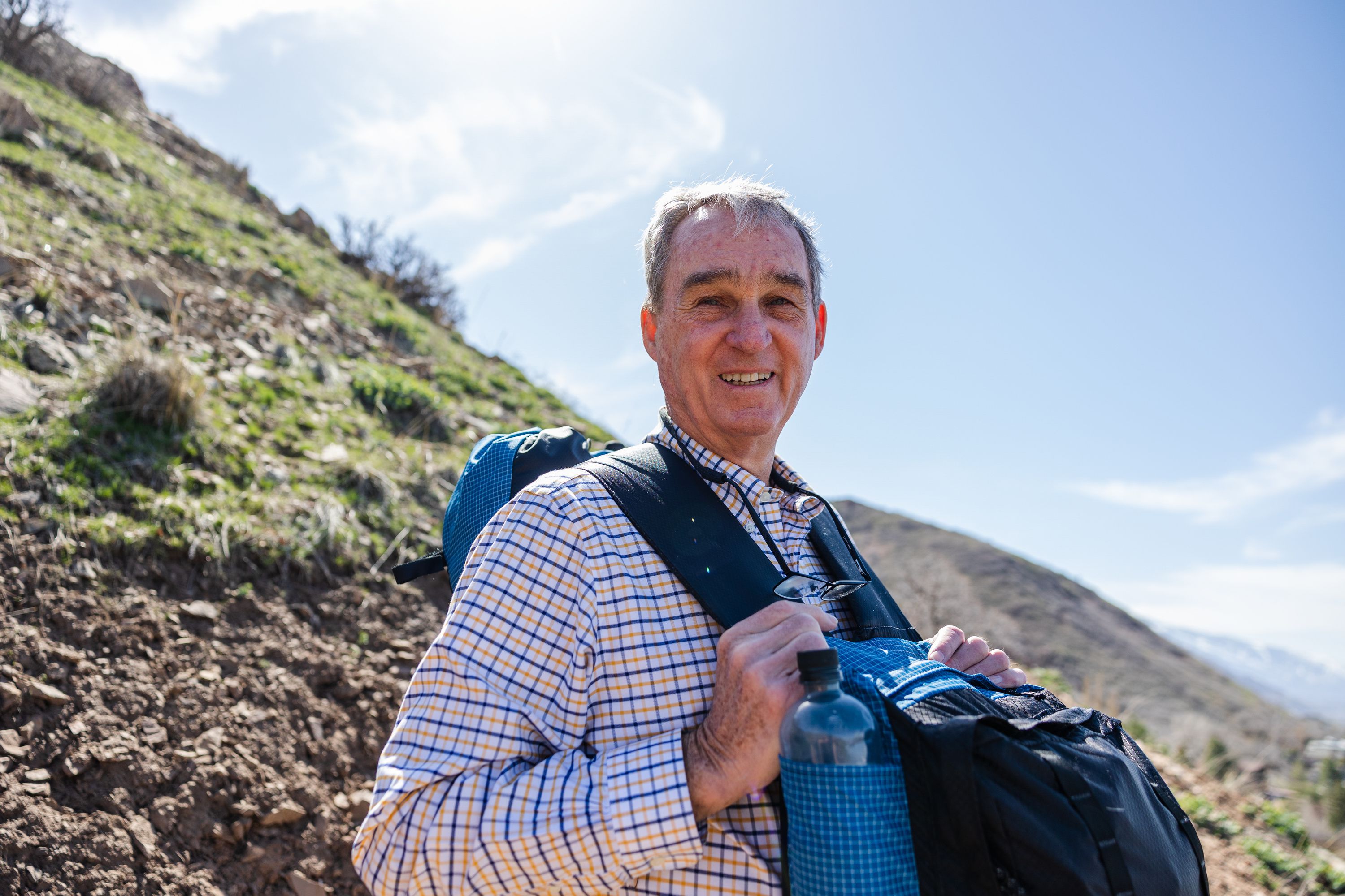 Avid hiker Richard Jones poses for a portrait along the Bonneville Shoreline Trail in the foothills above Salt Lake City on April 17.