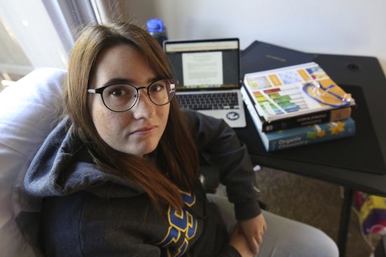 Ricki Korba, 23, sits for a portrait in her home in Bakersfield, Calif., April 14. Korba thought she was taking the right classes at Columbia College, a community college in Sonora. She worked with a counselor and used an online catalog that shows which courses were supposed to transfer to CSU schools. But when officials at Bakersfield reviewed the transcript, they said most of her classes wouldn’t count toward her major.